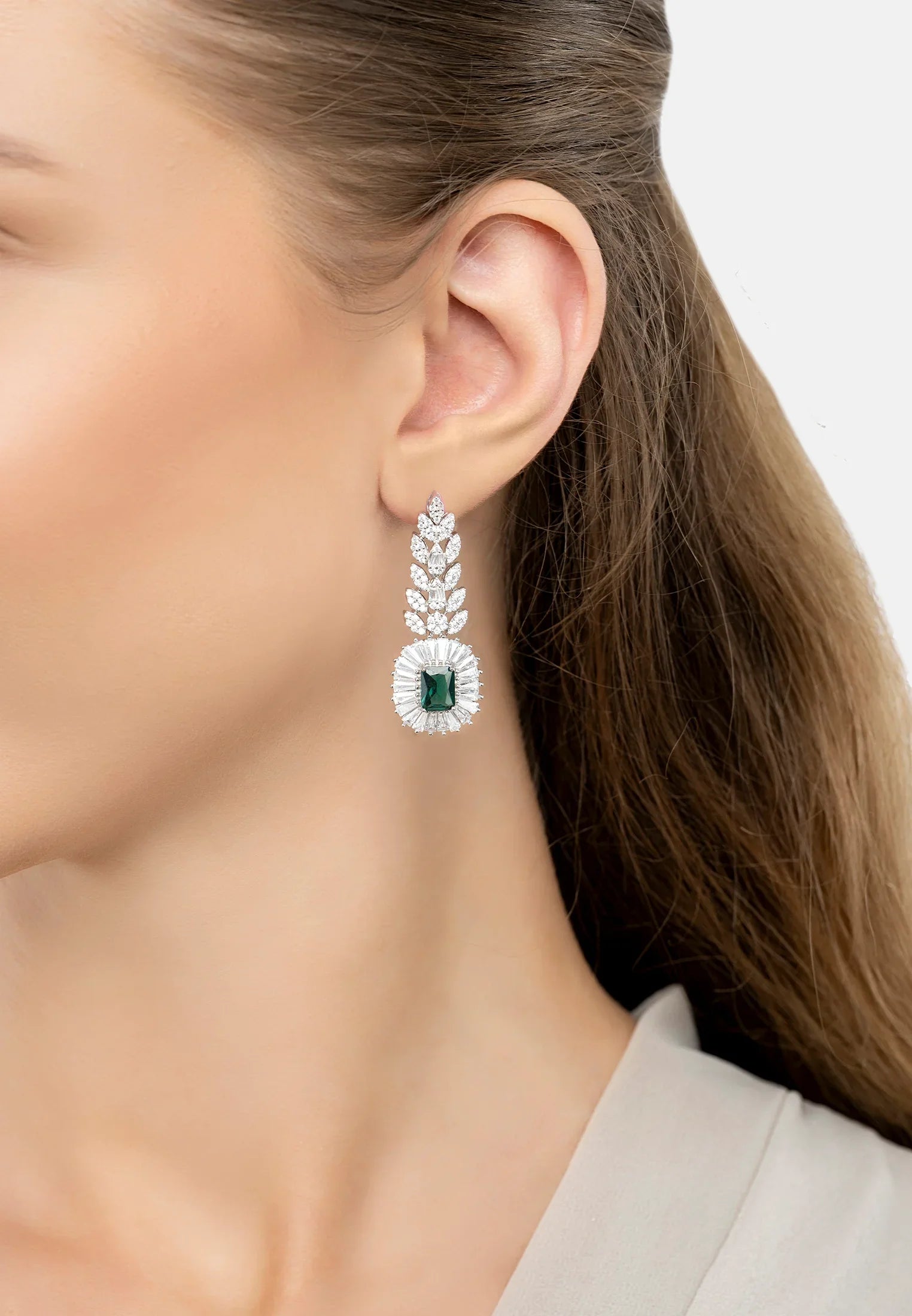 The earring worn by a model.