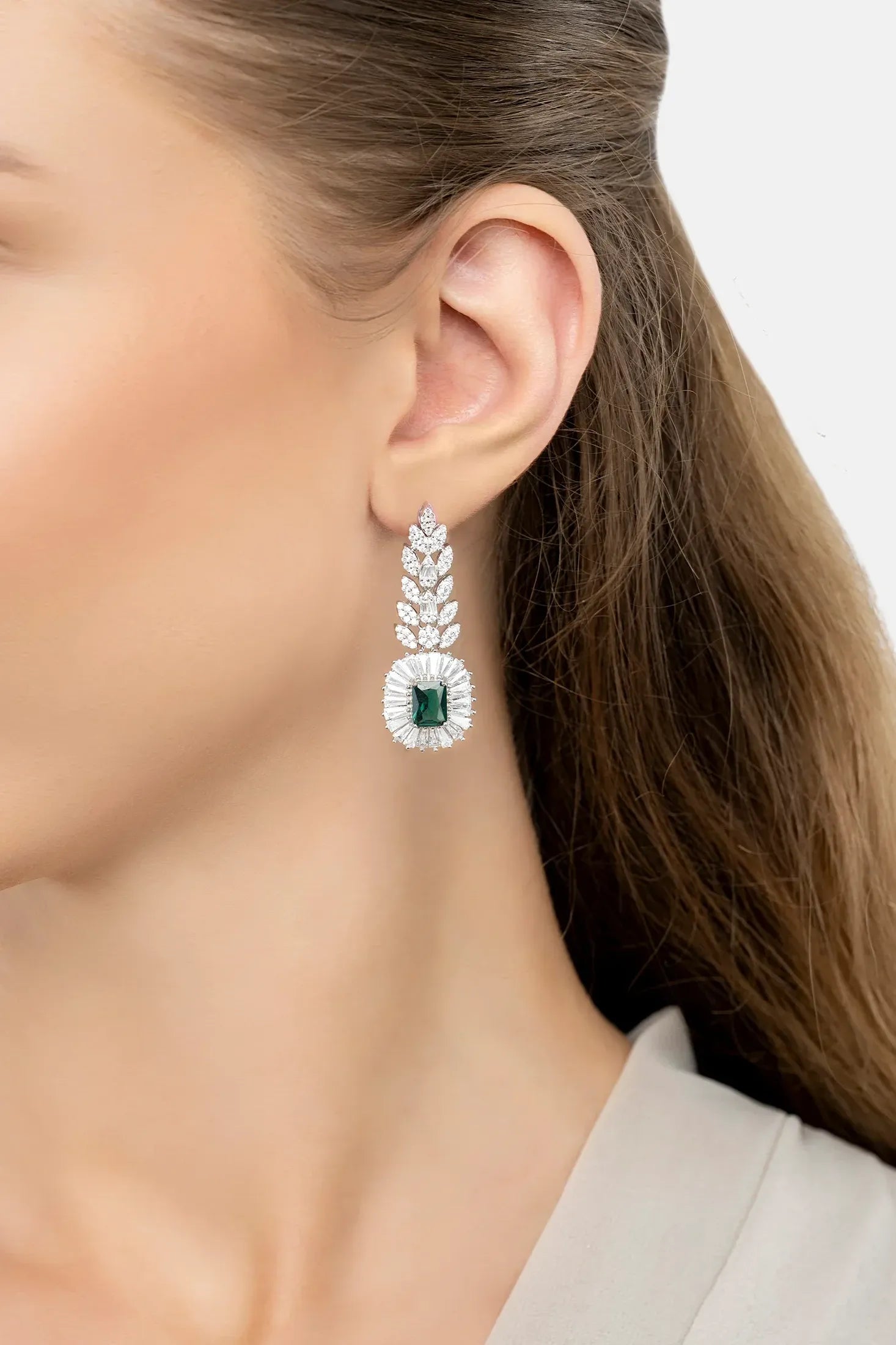 The earring worn by a model.