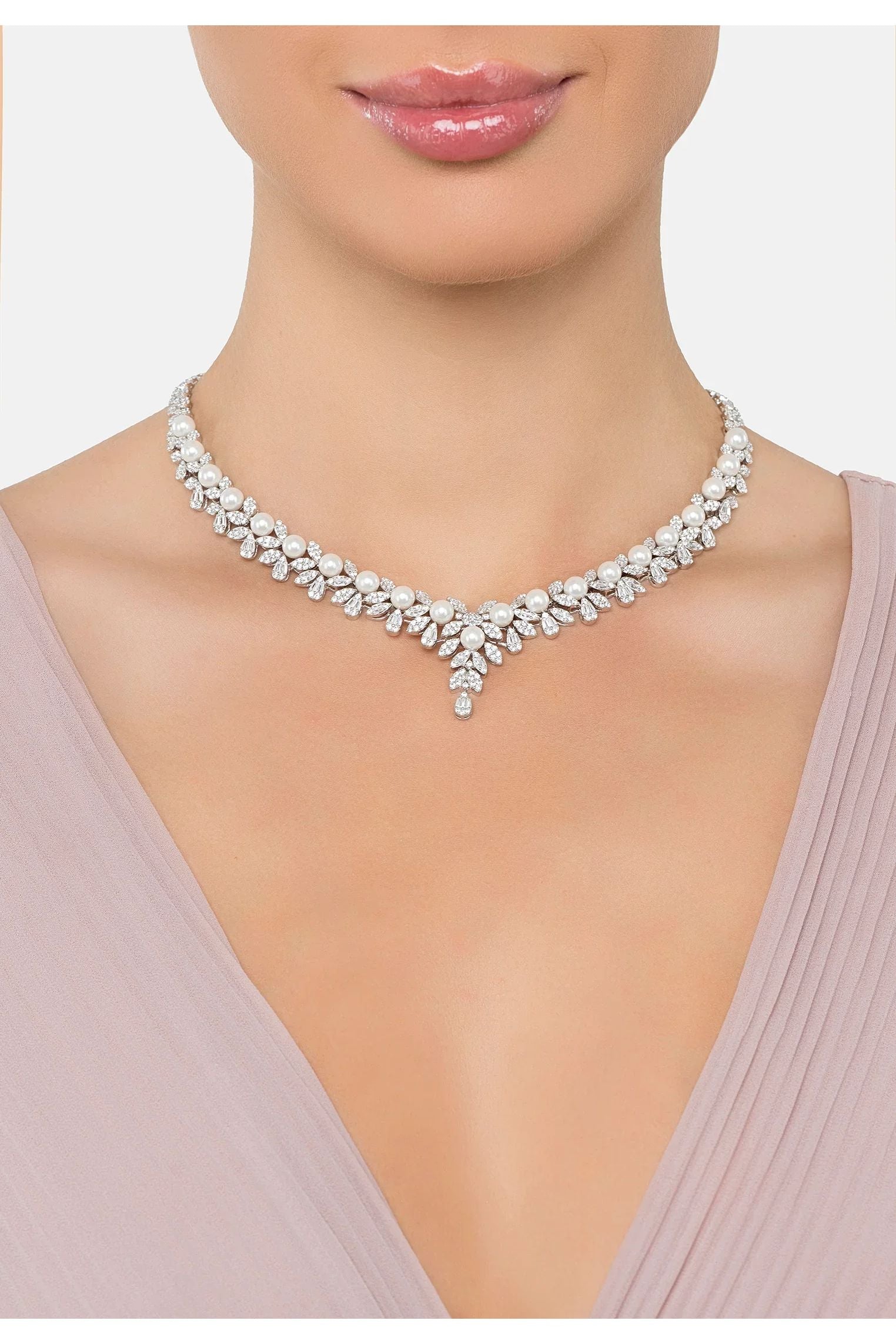 The necklace worn by a model.