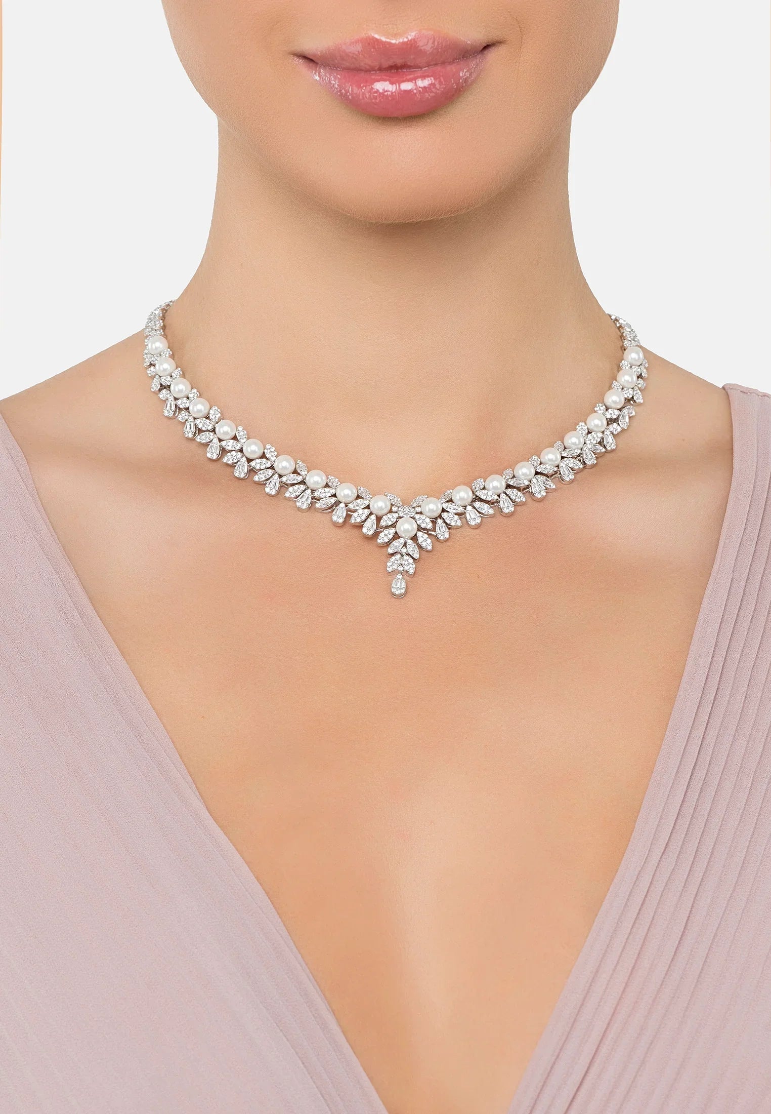 The necklace worn by a model.