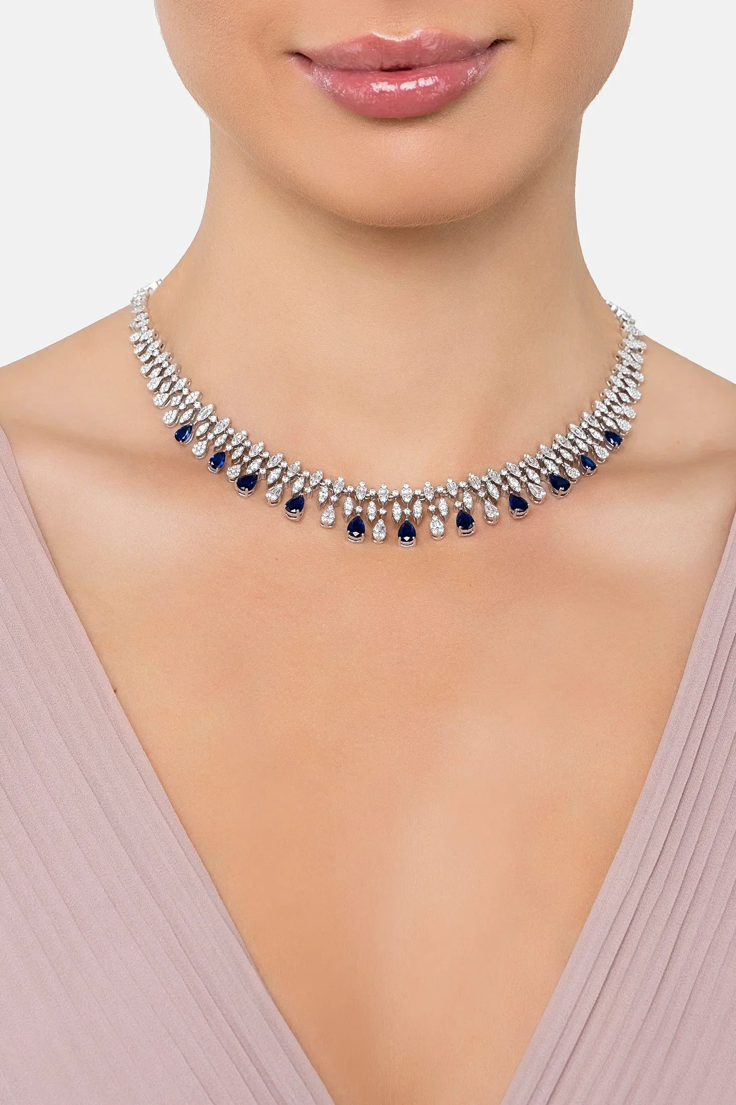 The necklace worn by a model.
