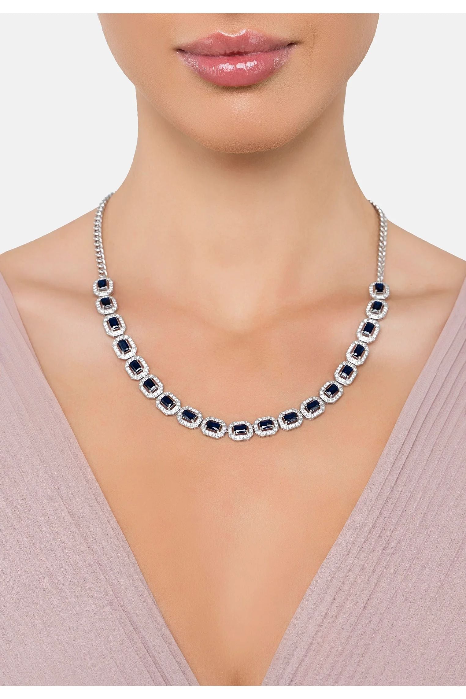 The necklace worn by a model.