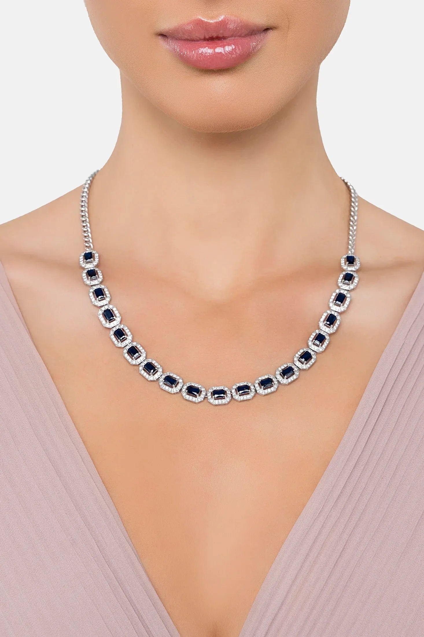 The necklace worn by a model.
