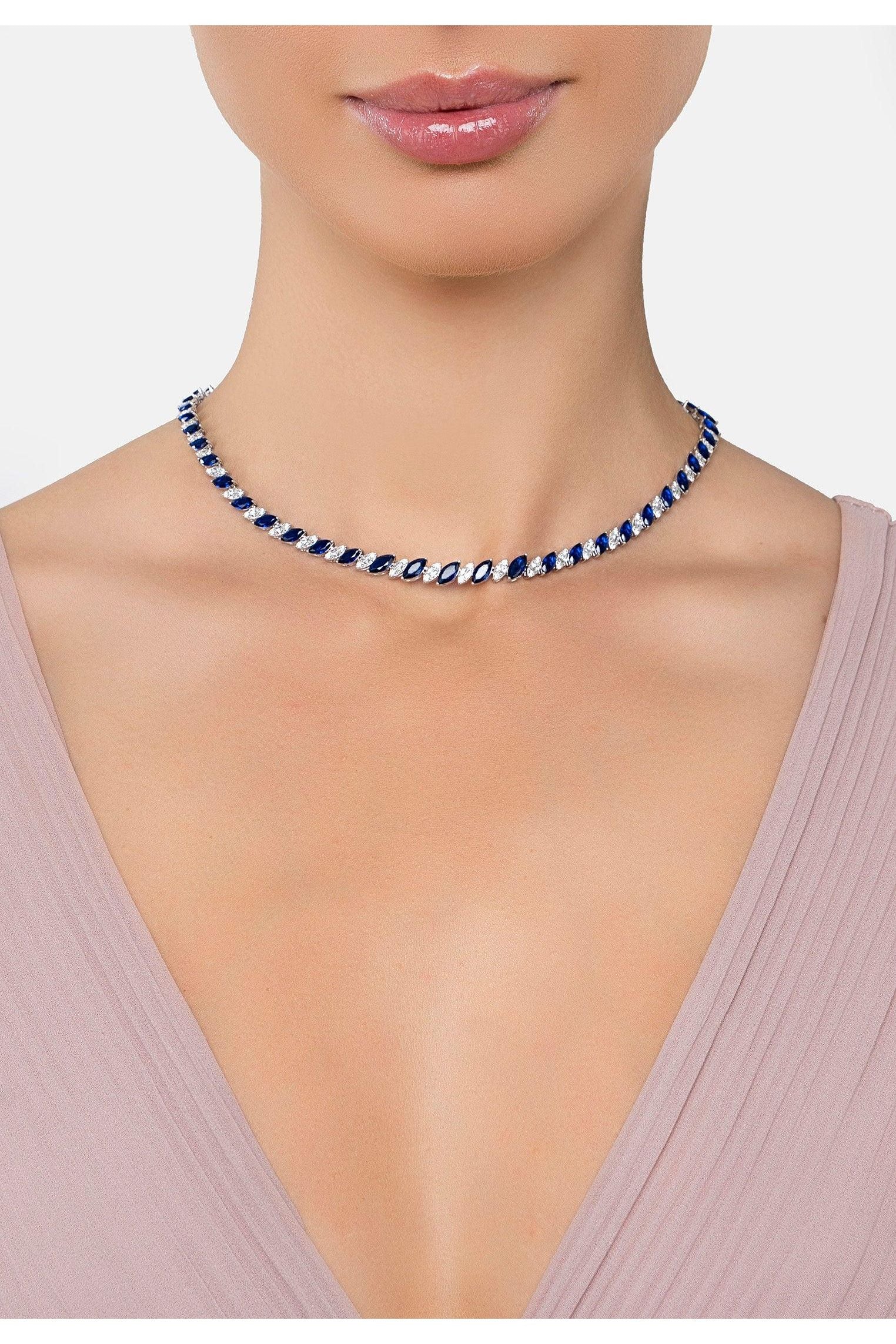 The necklace worn by a model.