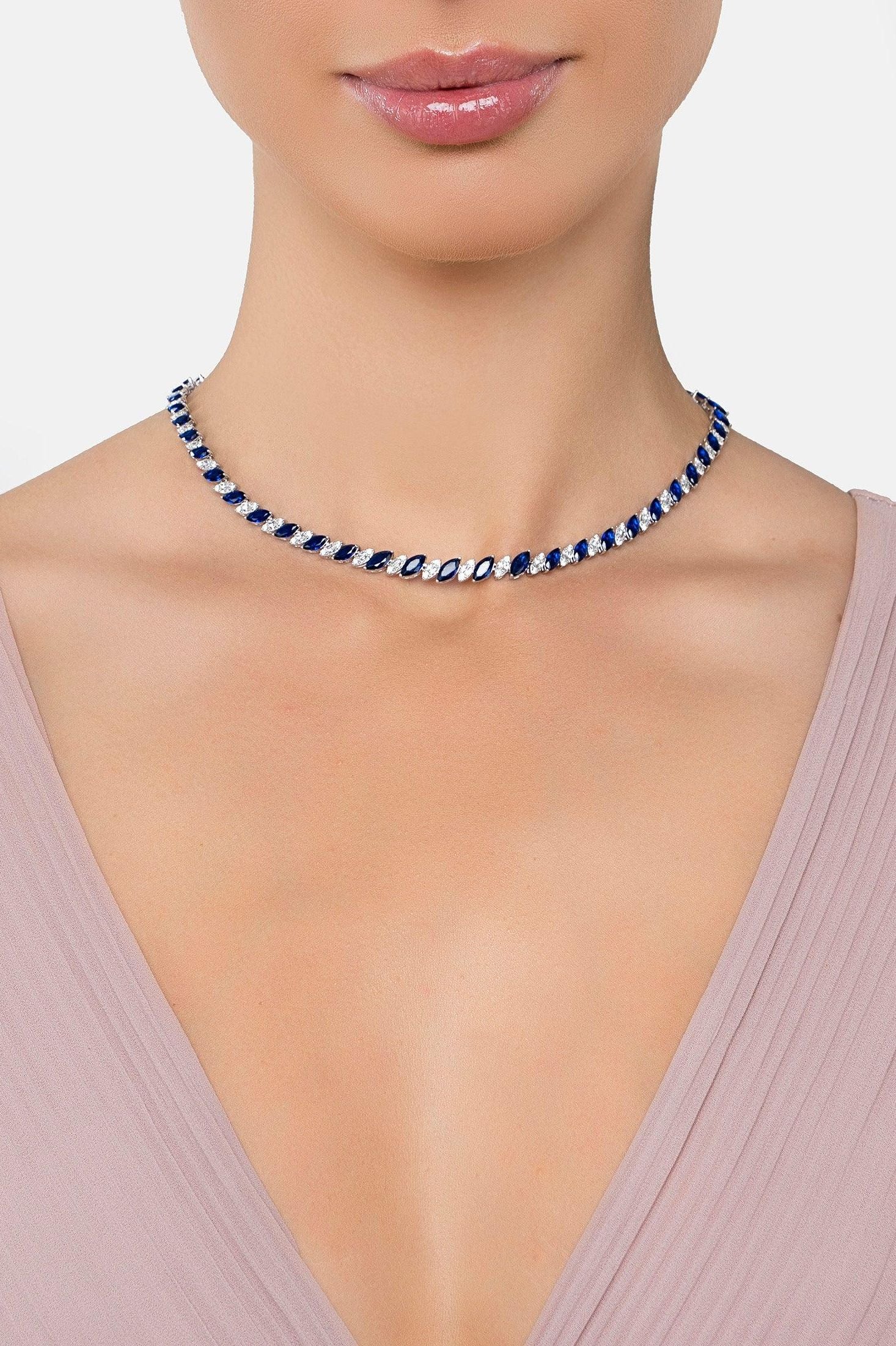 The necklace worn by a model.