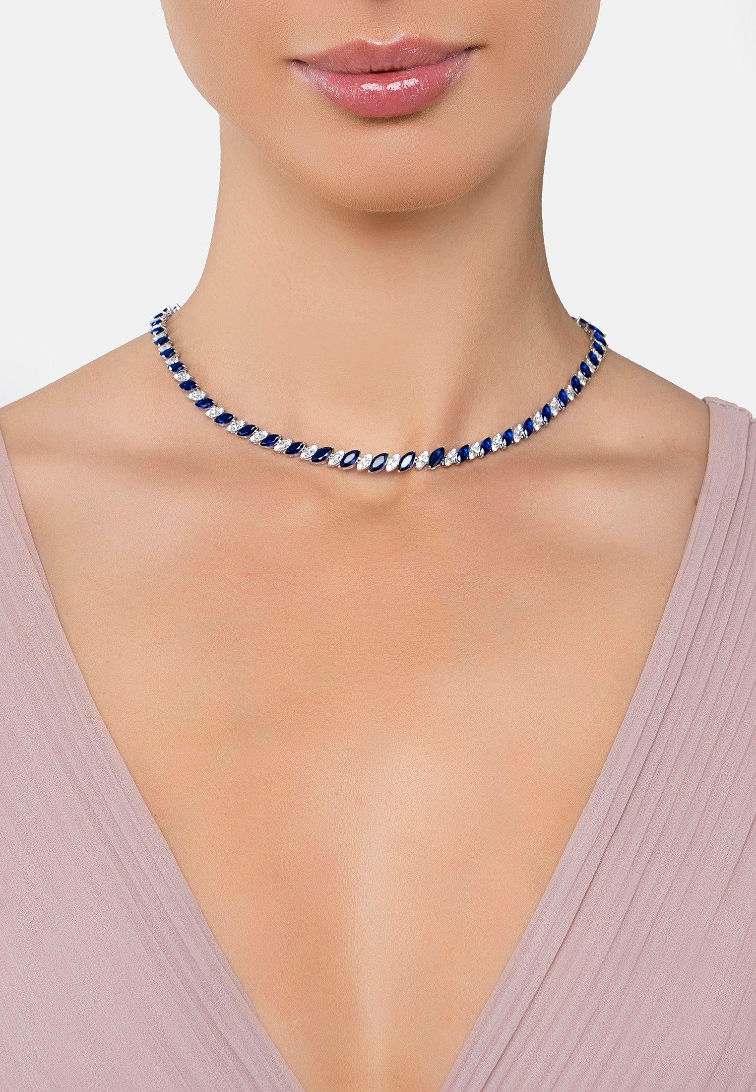 The necklace worn by a model.