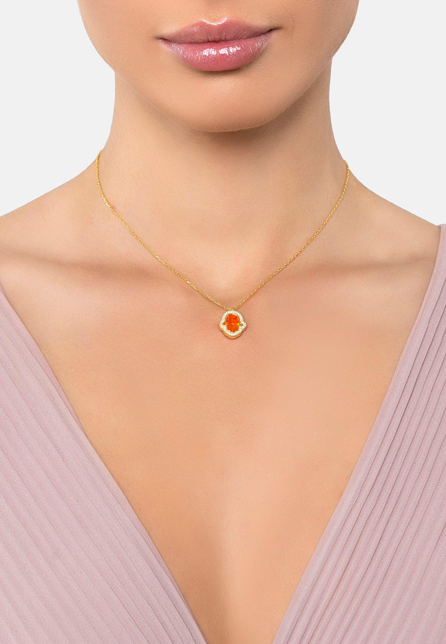The necklace worn by a model.