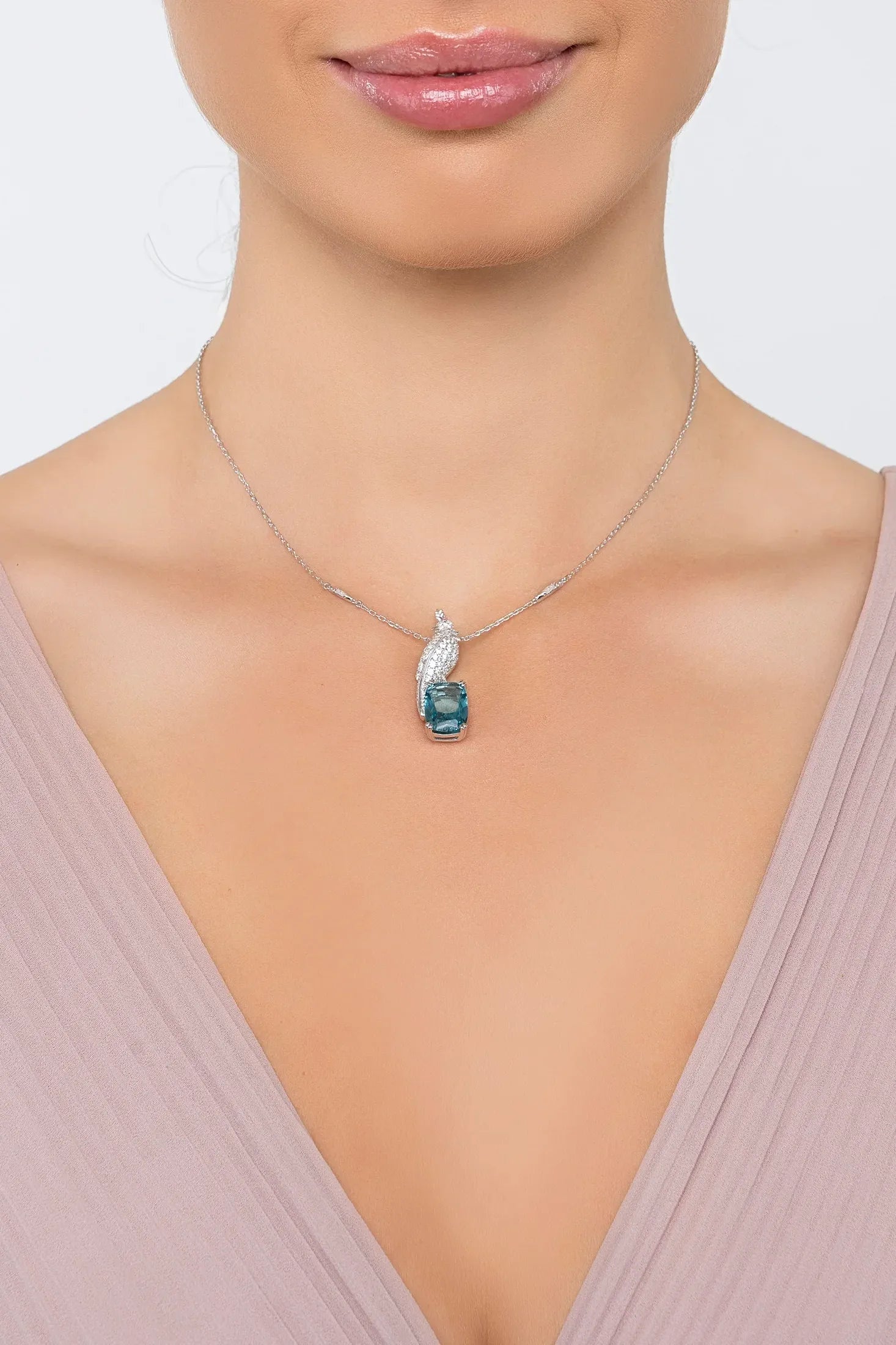 The necklace worn by a model.