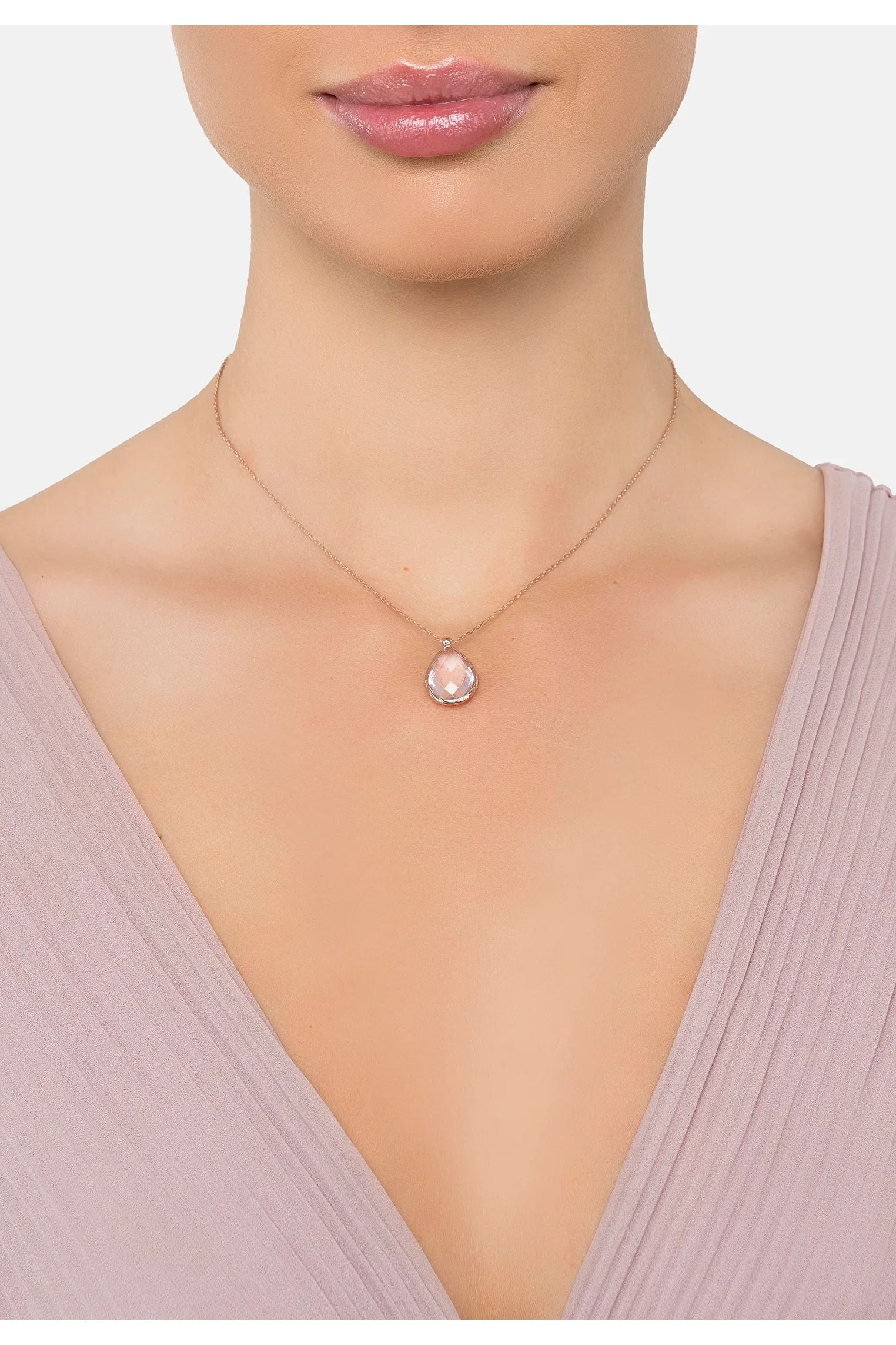 The necklace worn by a model.