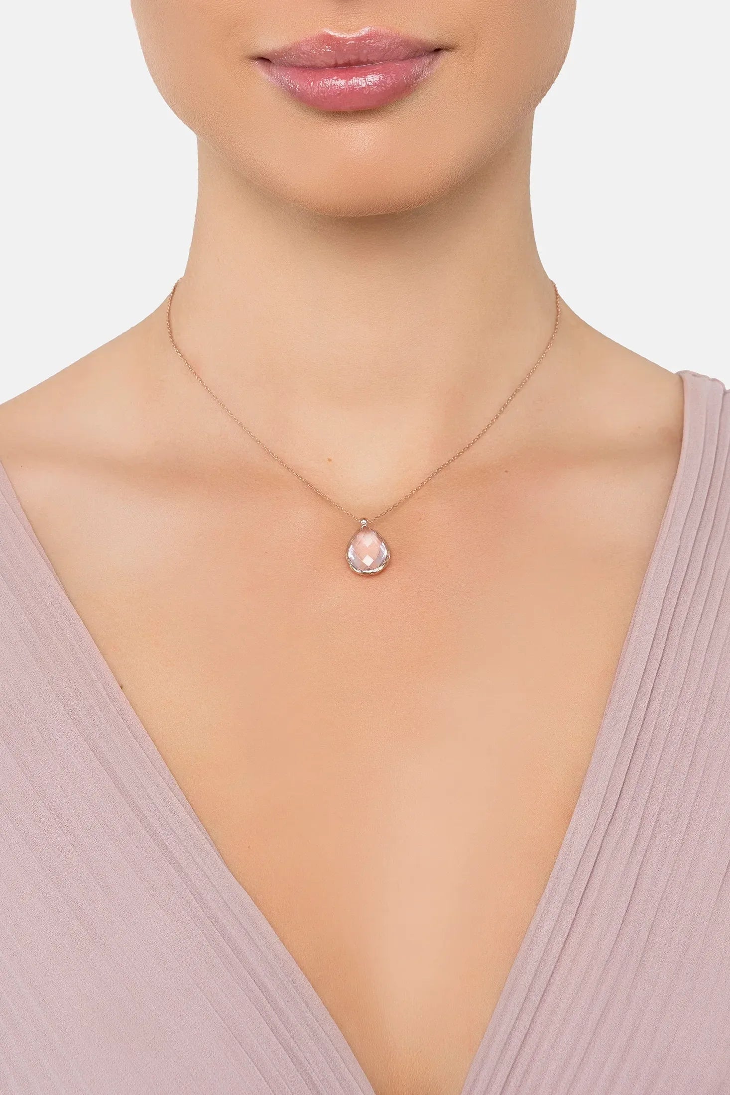 The necklace worn by a model.