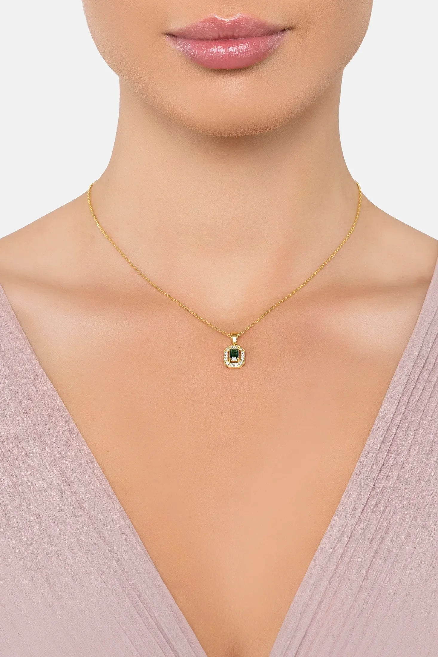 The necklace worn by a model.