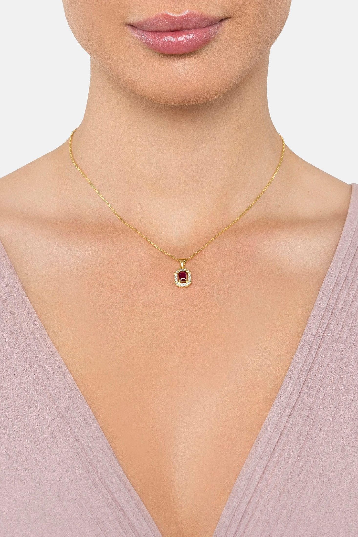 The necklace worn by a model.