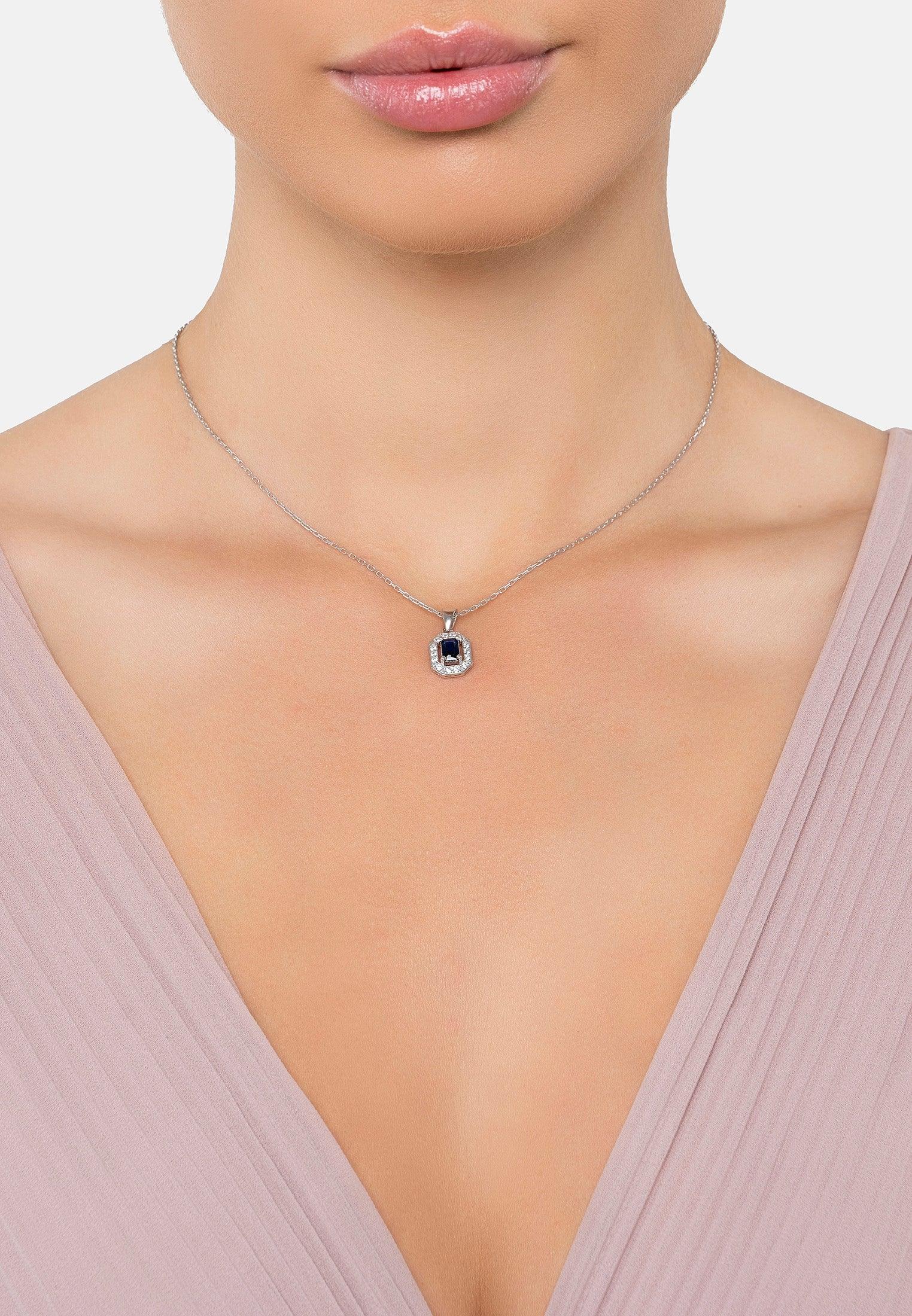 The necklace worn by a model.