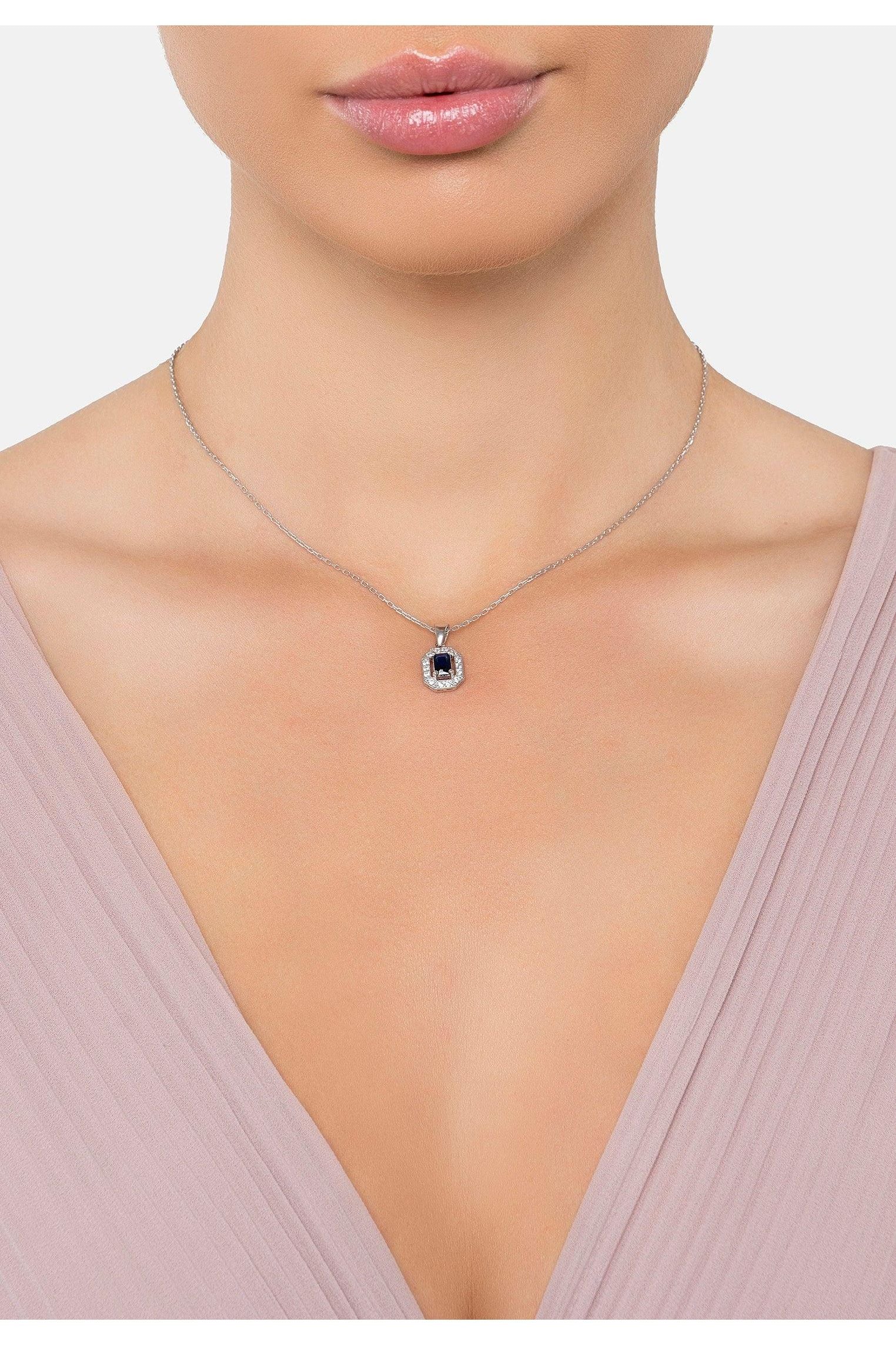 The necklace worn by a model.