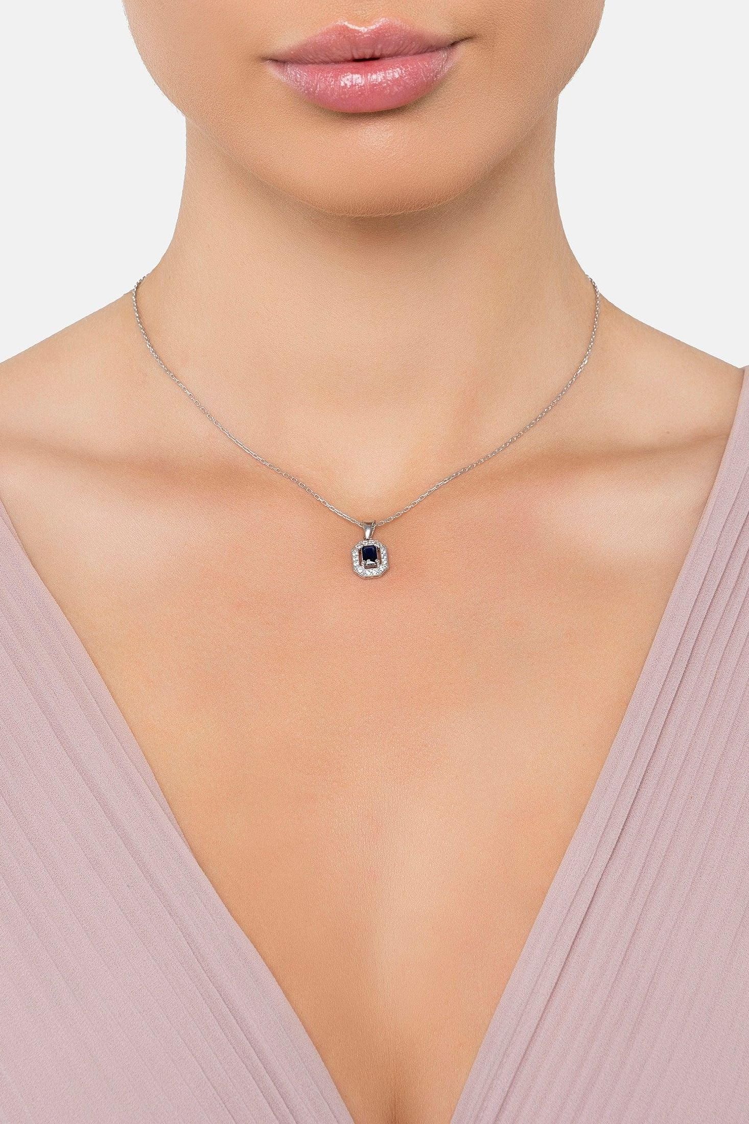 The necklace worn by a model.