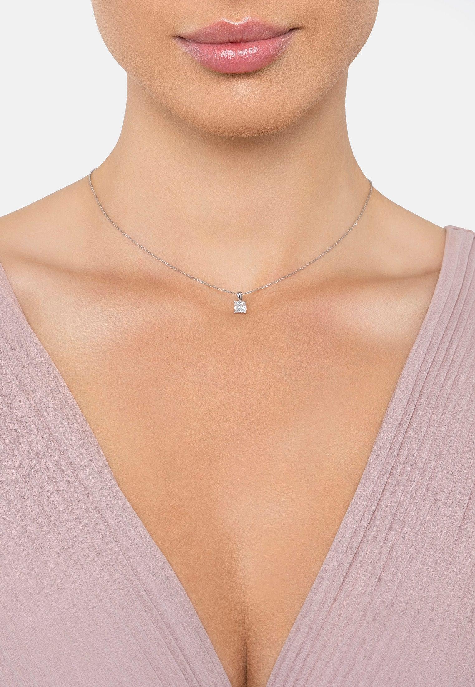 The necklace worn by a model.