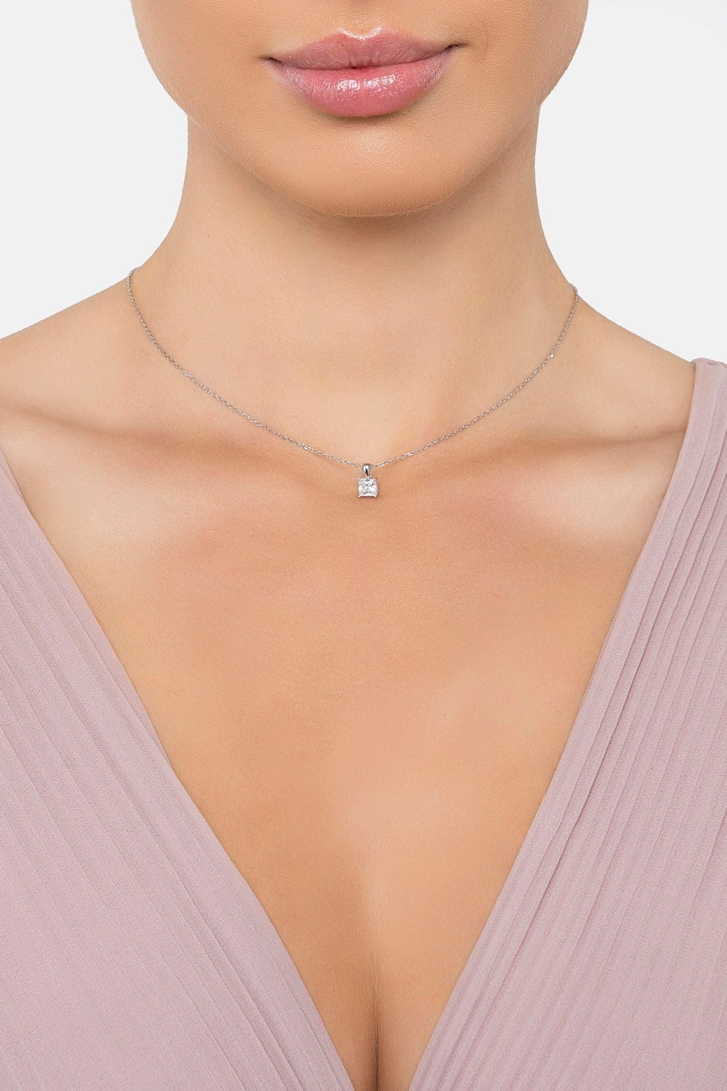 The necklace worn by a model.