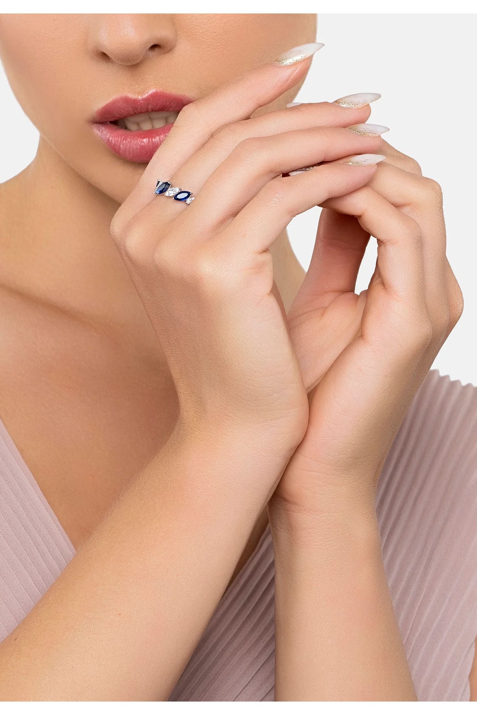 The ring worn by a model.