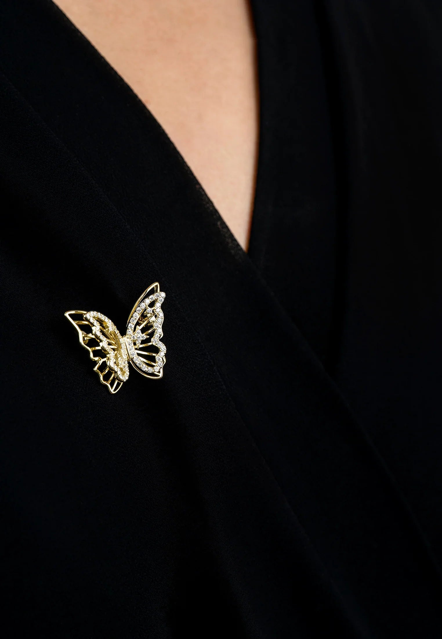 The brooch worn by a model.