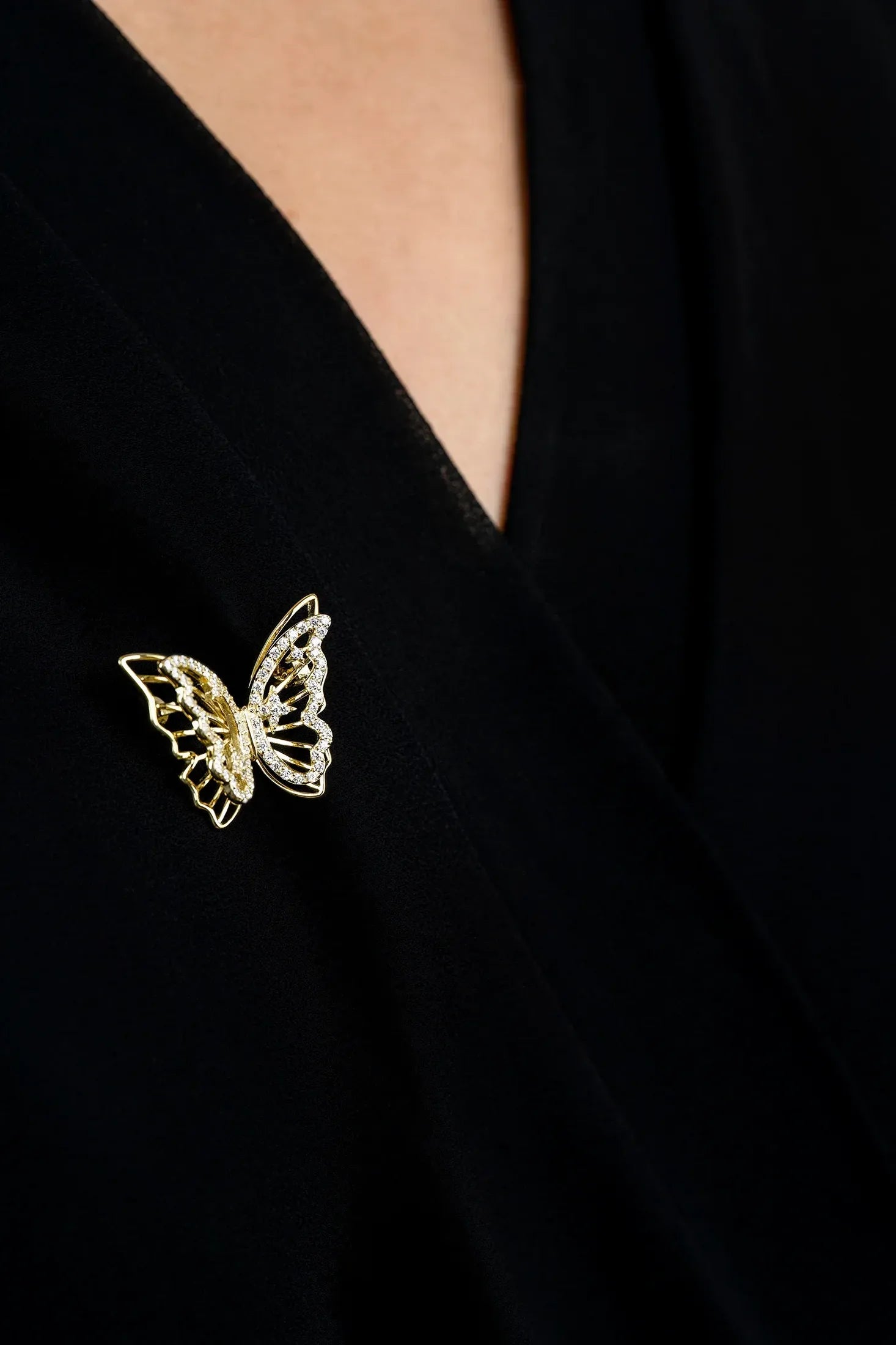 The brooch worn by a model.