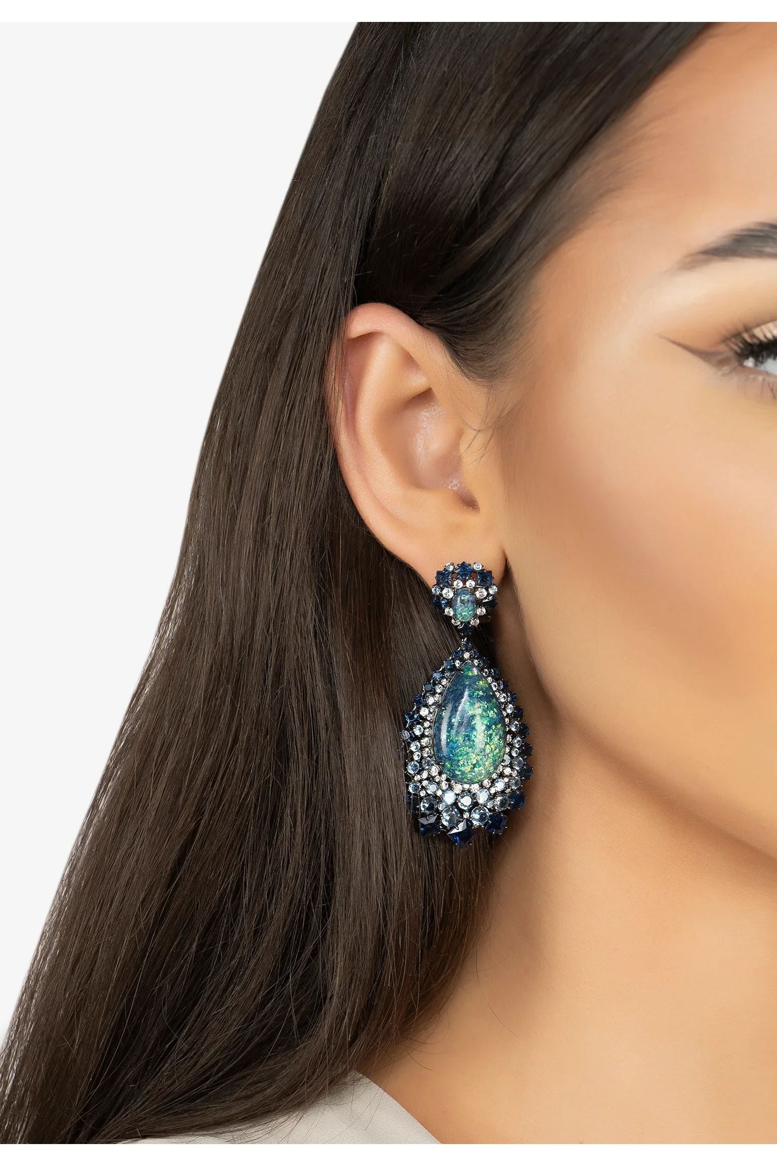 The earring worn by a model.