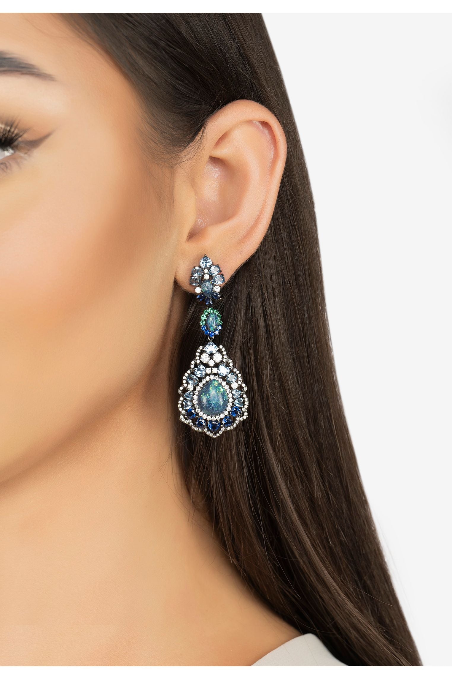 The earring worn by a model.
