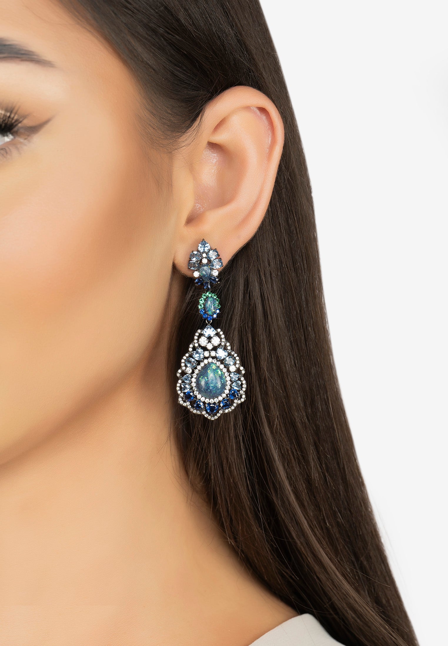 The earring worn by a model.
