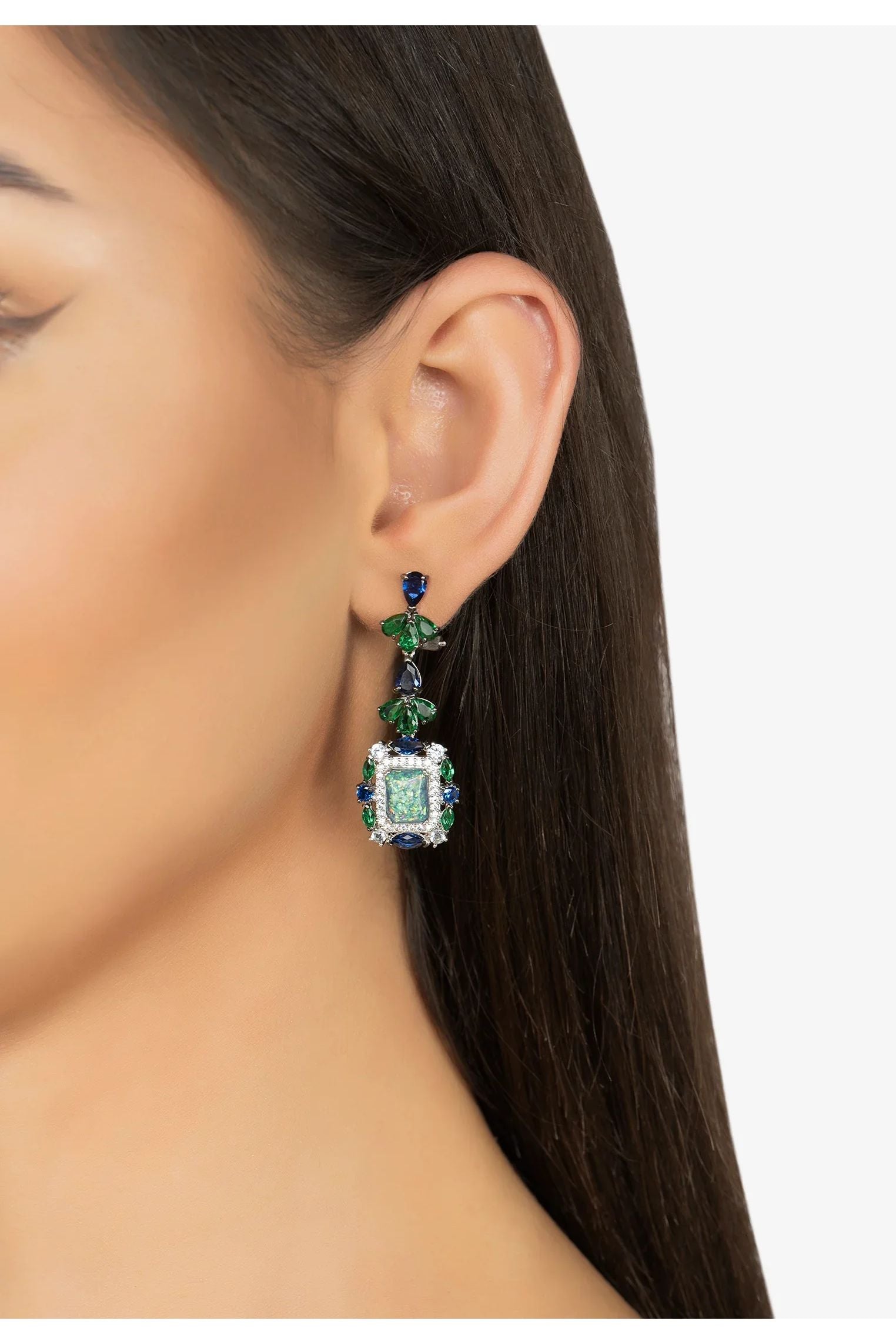 The earring worn by a model.