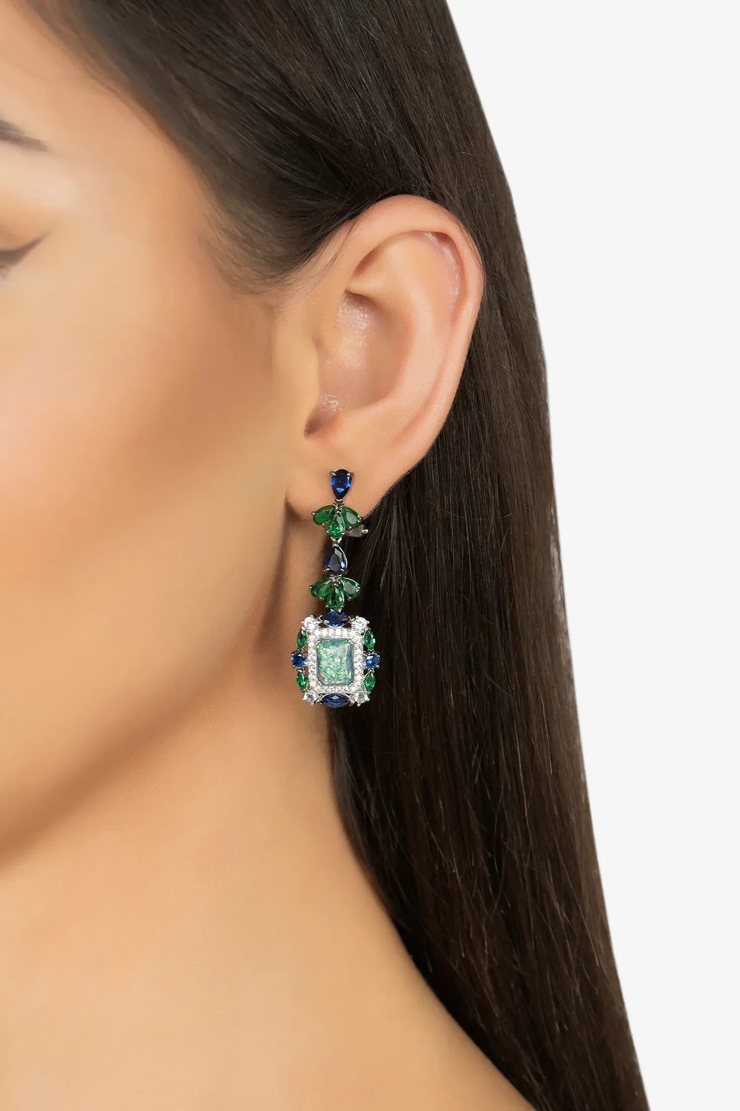 The earring worn by a model.