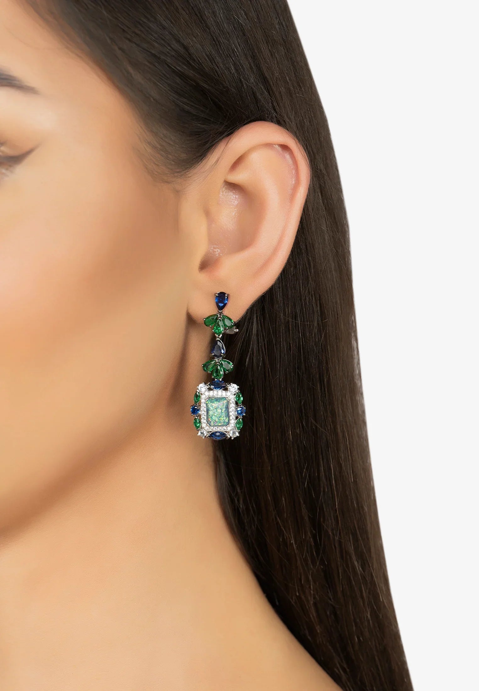 The earring worn by a model.