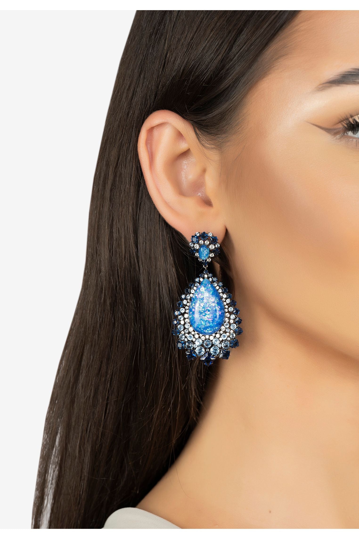 The earring worn by a model.