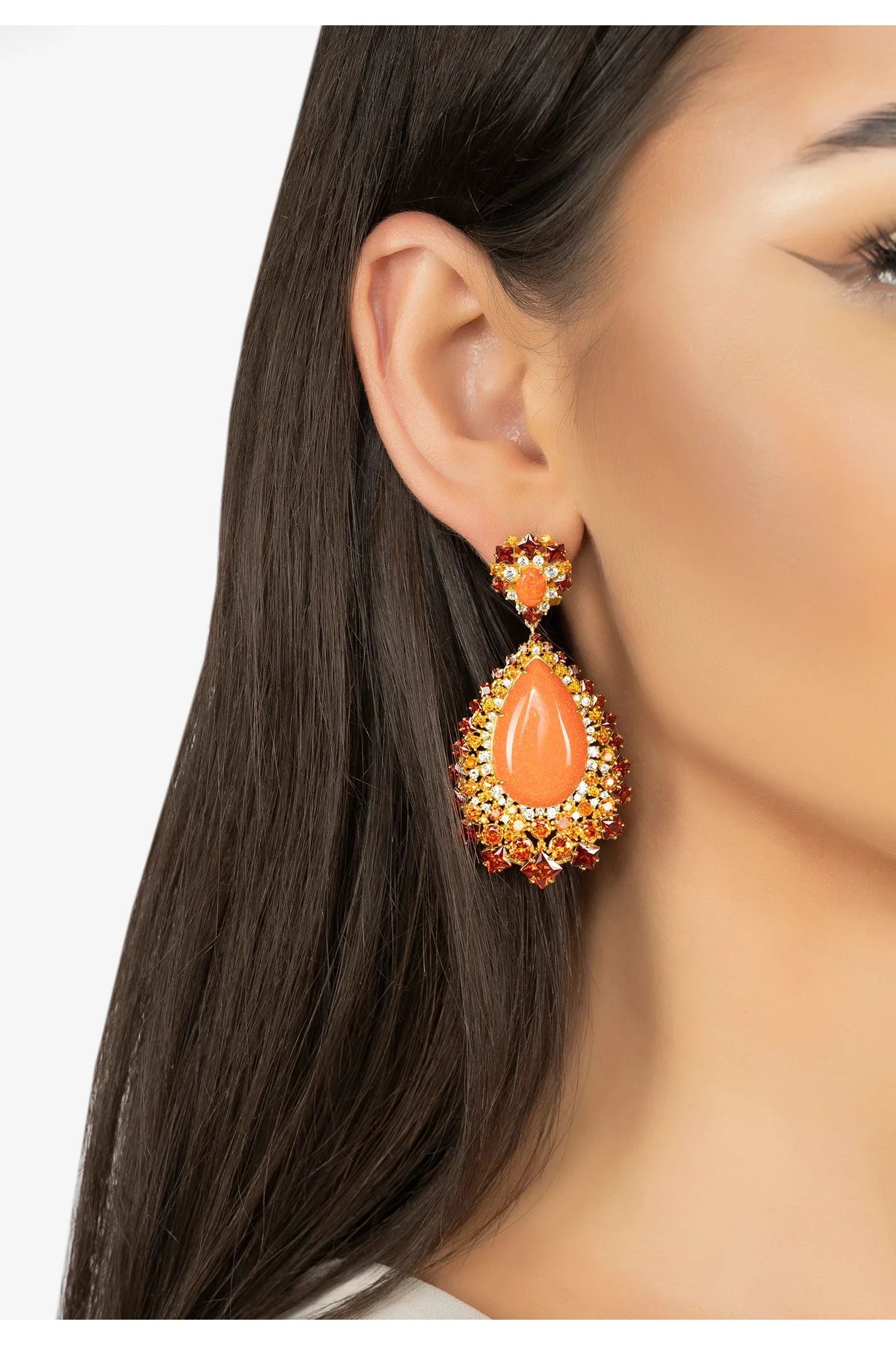 The earring worn by a model.