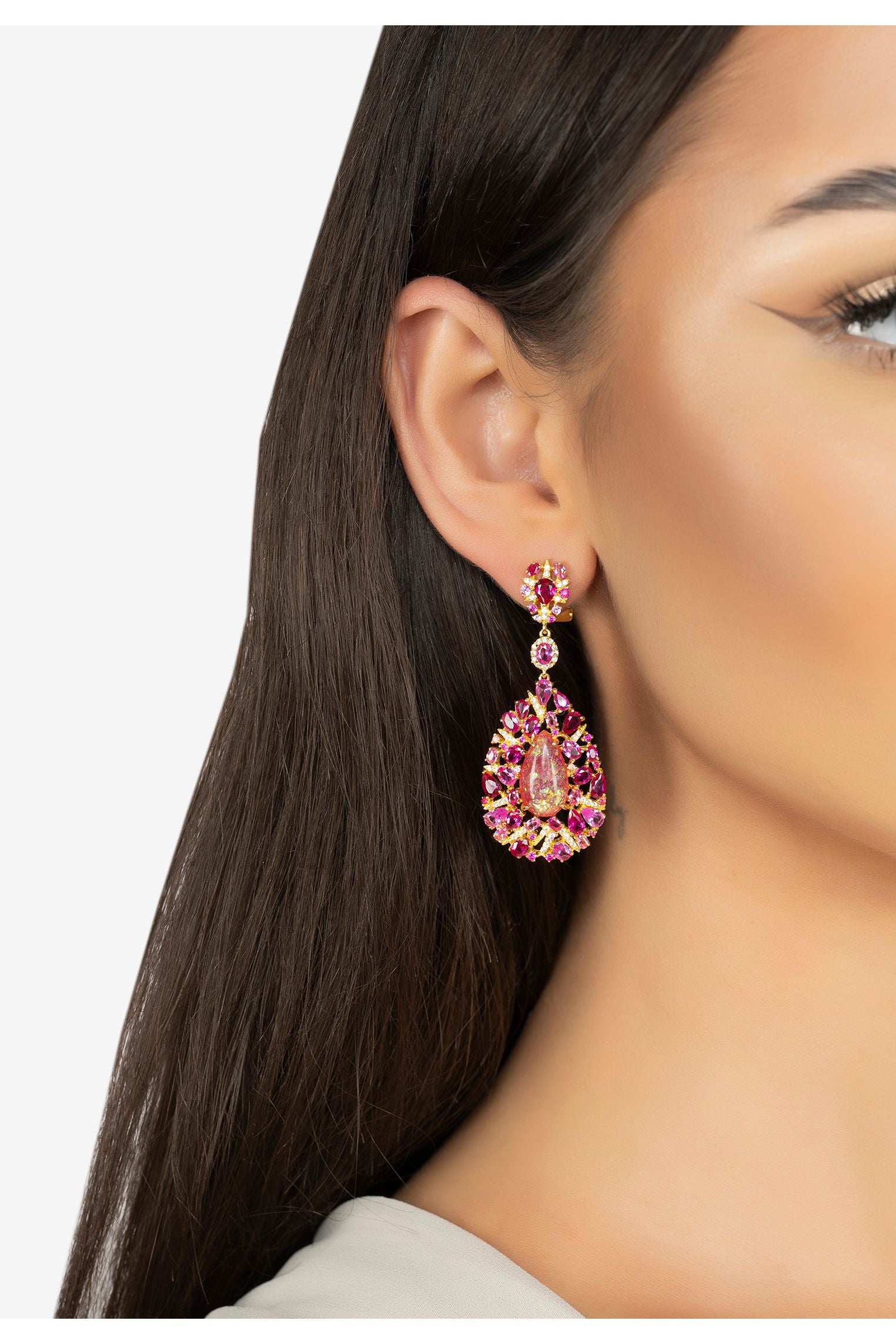 The earring worn by a model.