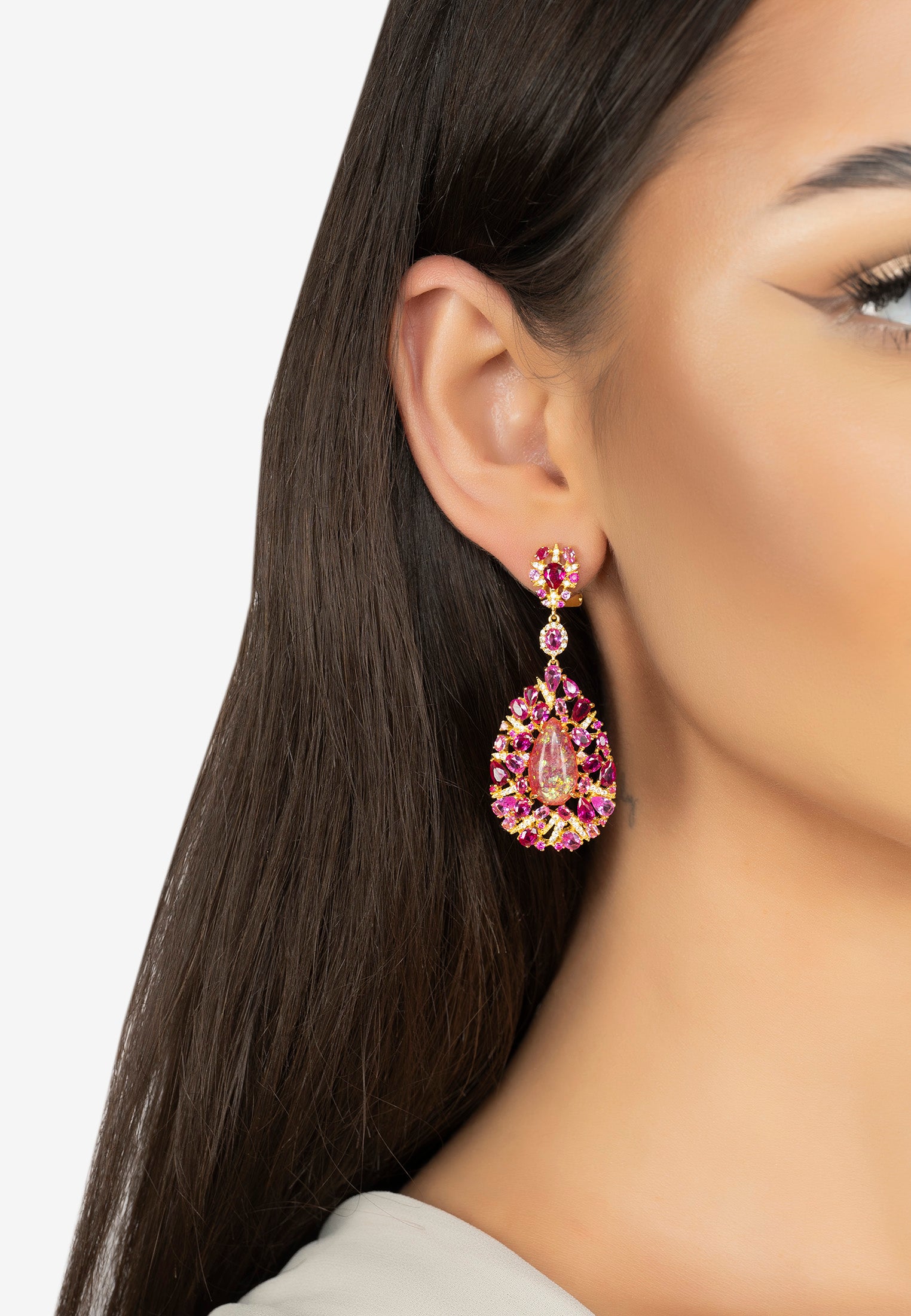 The earring worn by a model.
