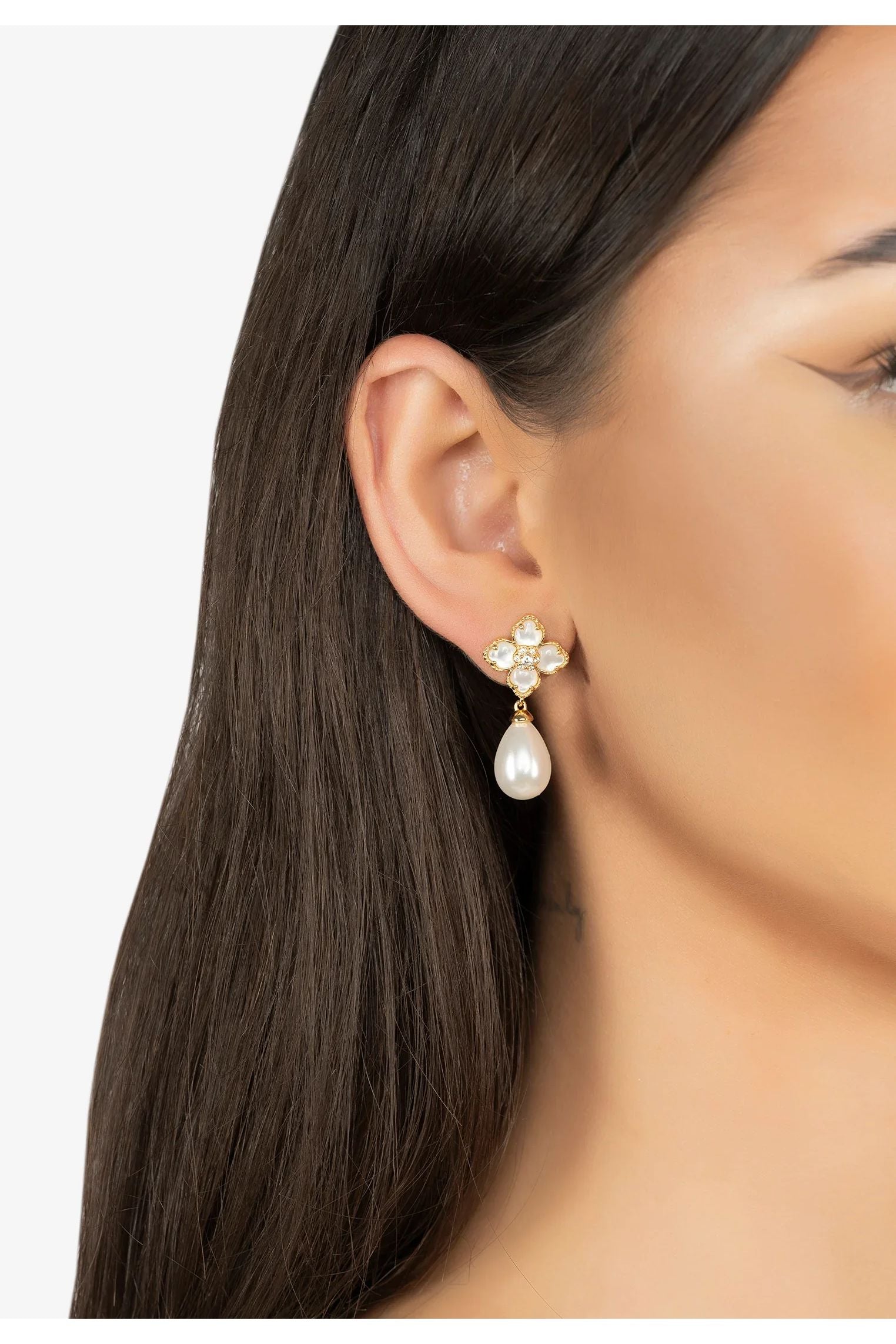 The earring worn by a model.
