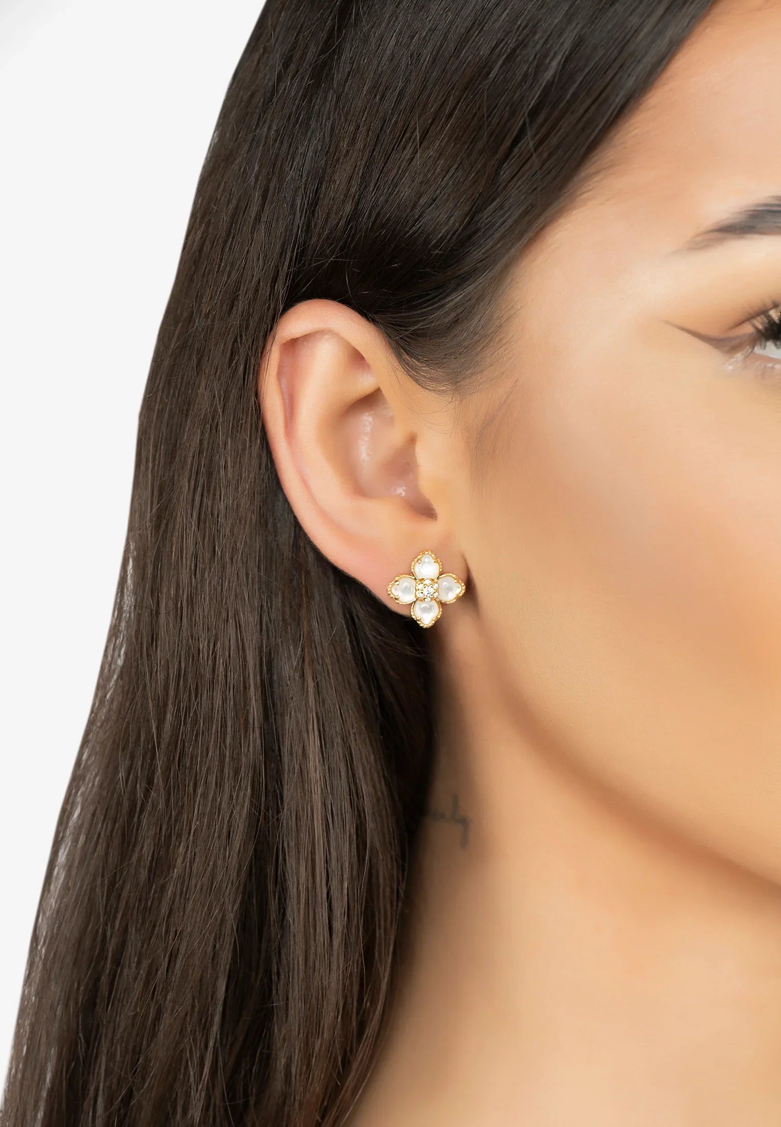 The earring worn by a model.
