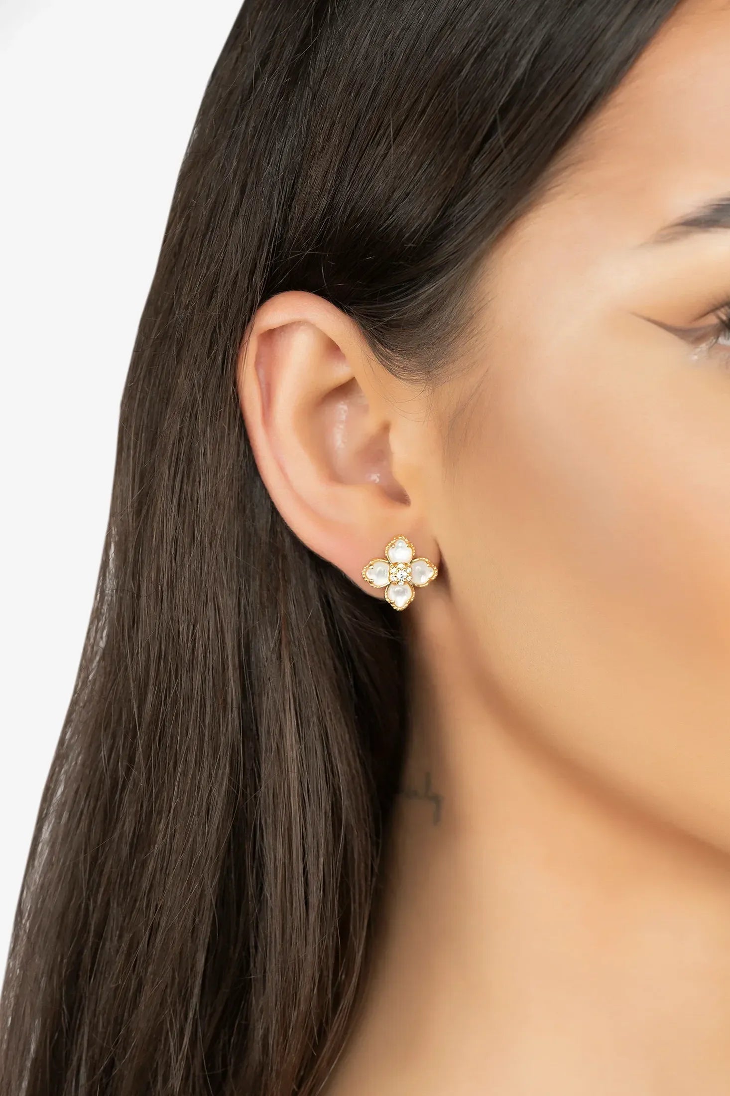 The earring worn by a model.