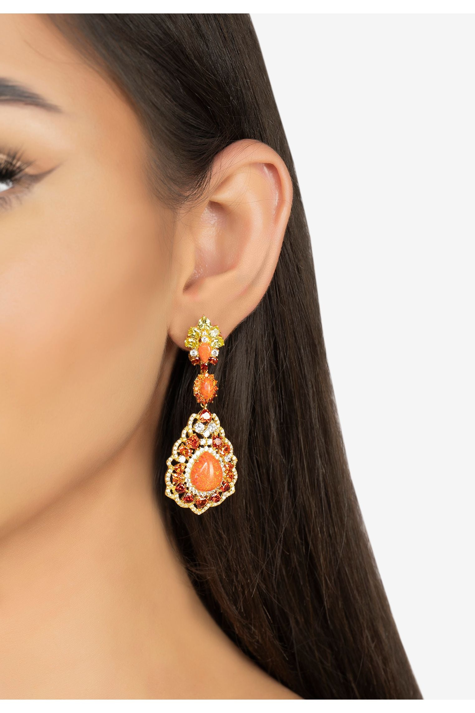 The earring worn by a model.