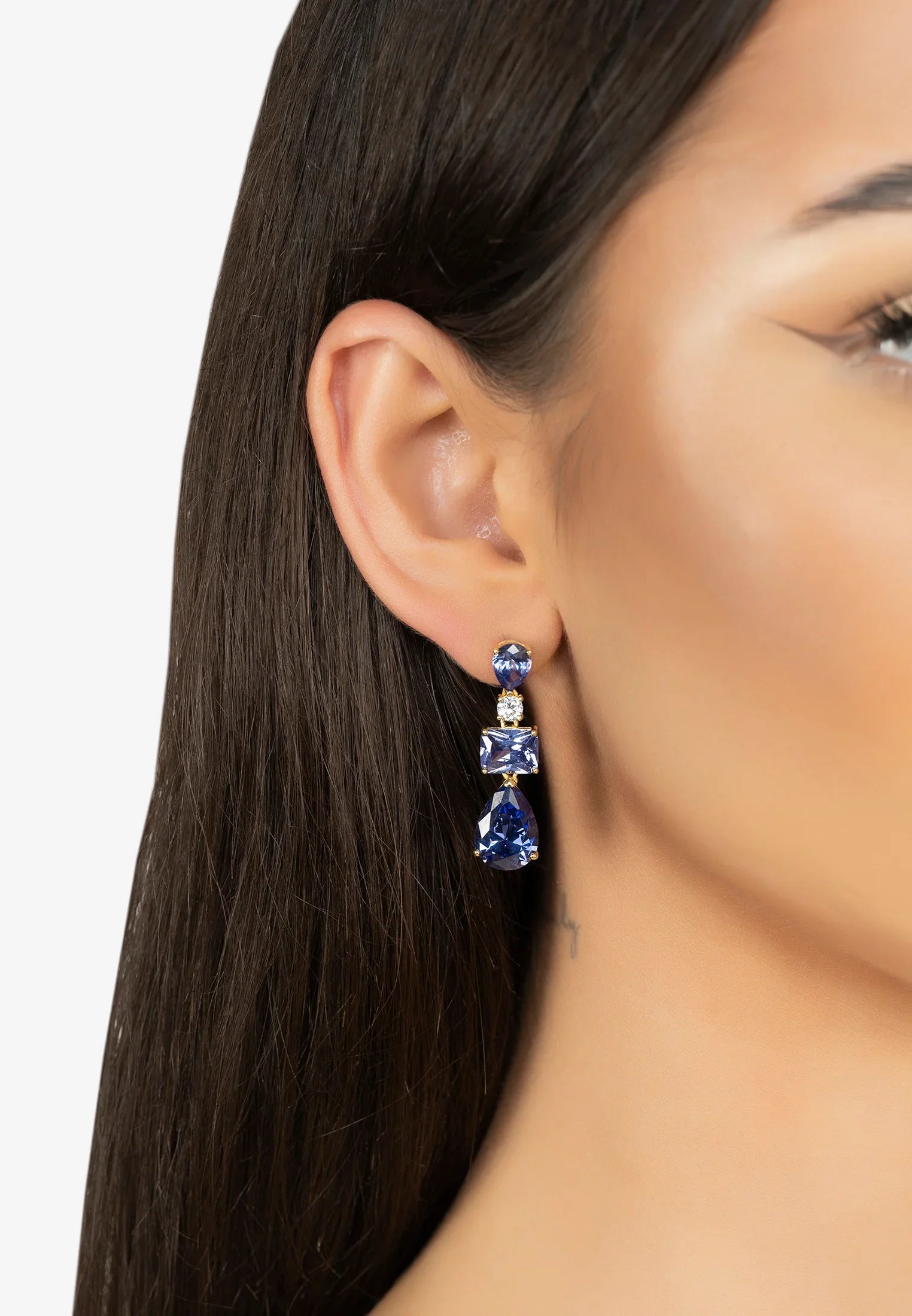 The earring worn by a model.
