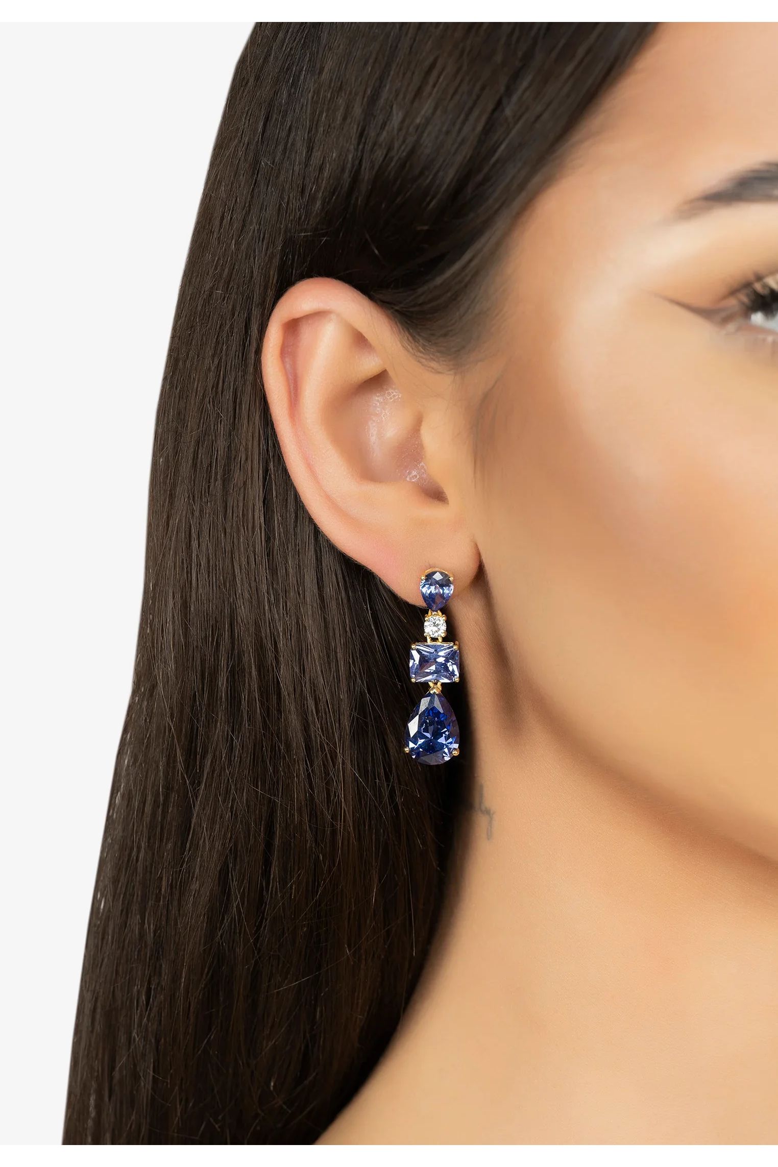 The earring worn by a model.