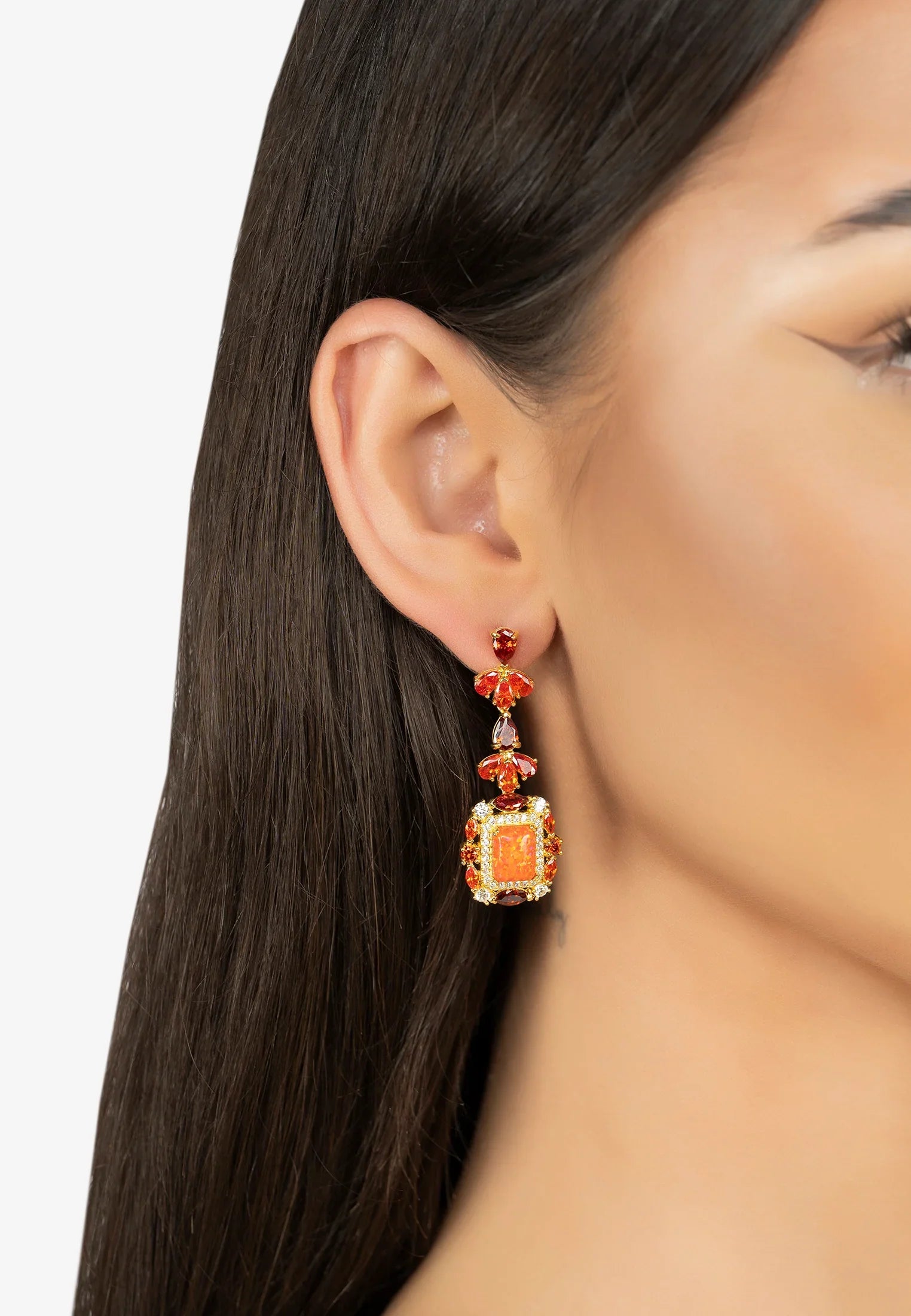 The earring worn by a model.