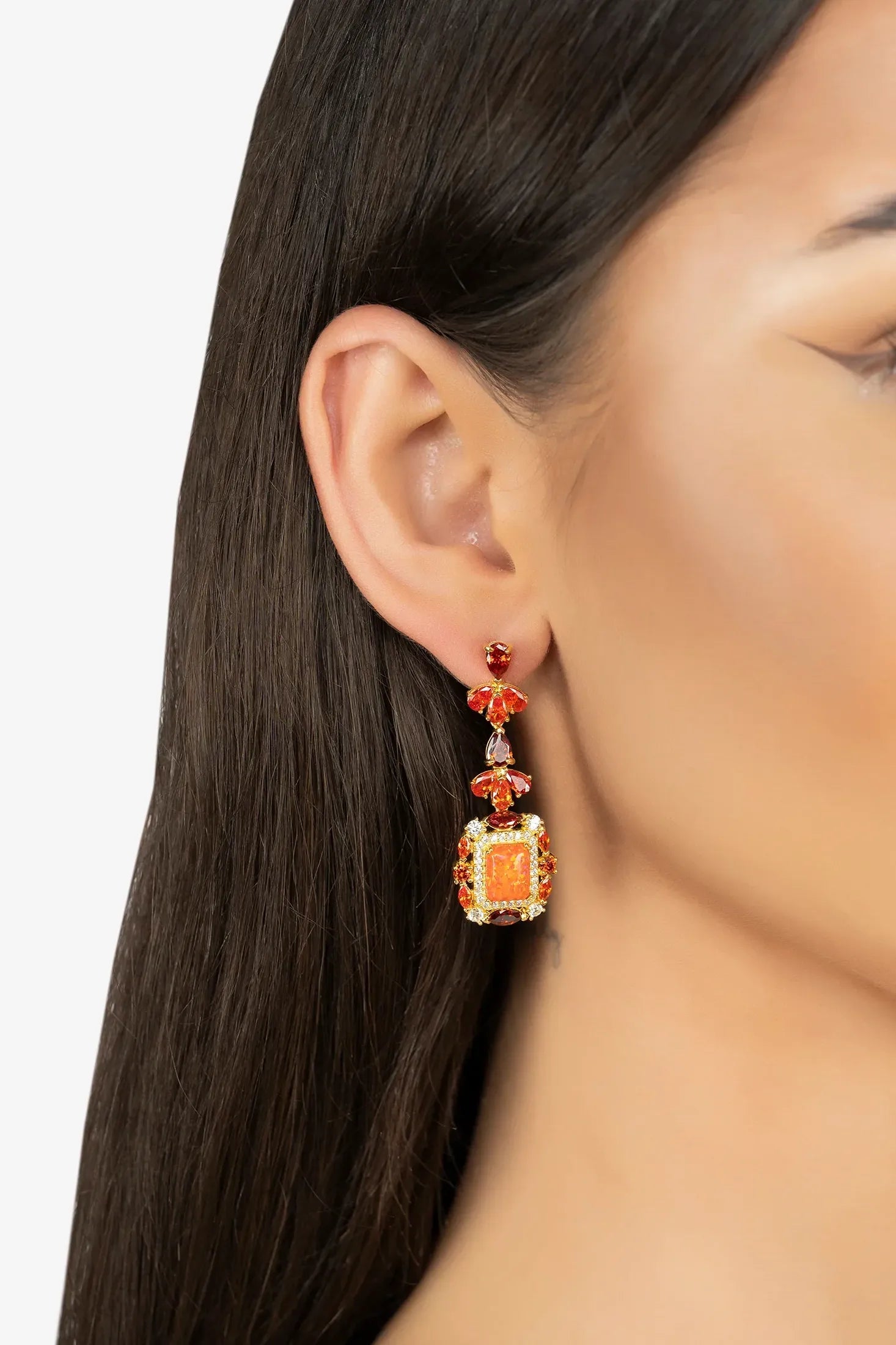 The earring worn by a model.