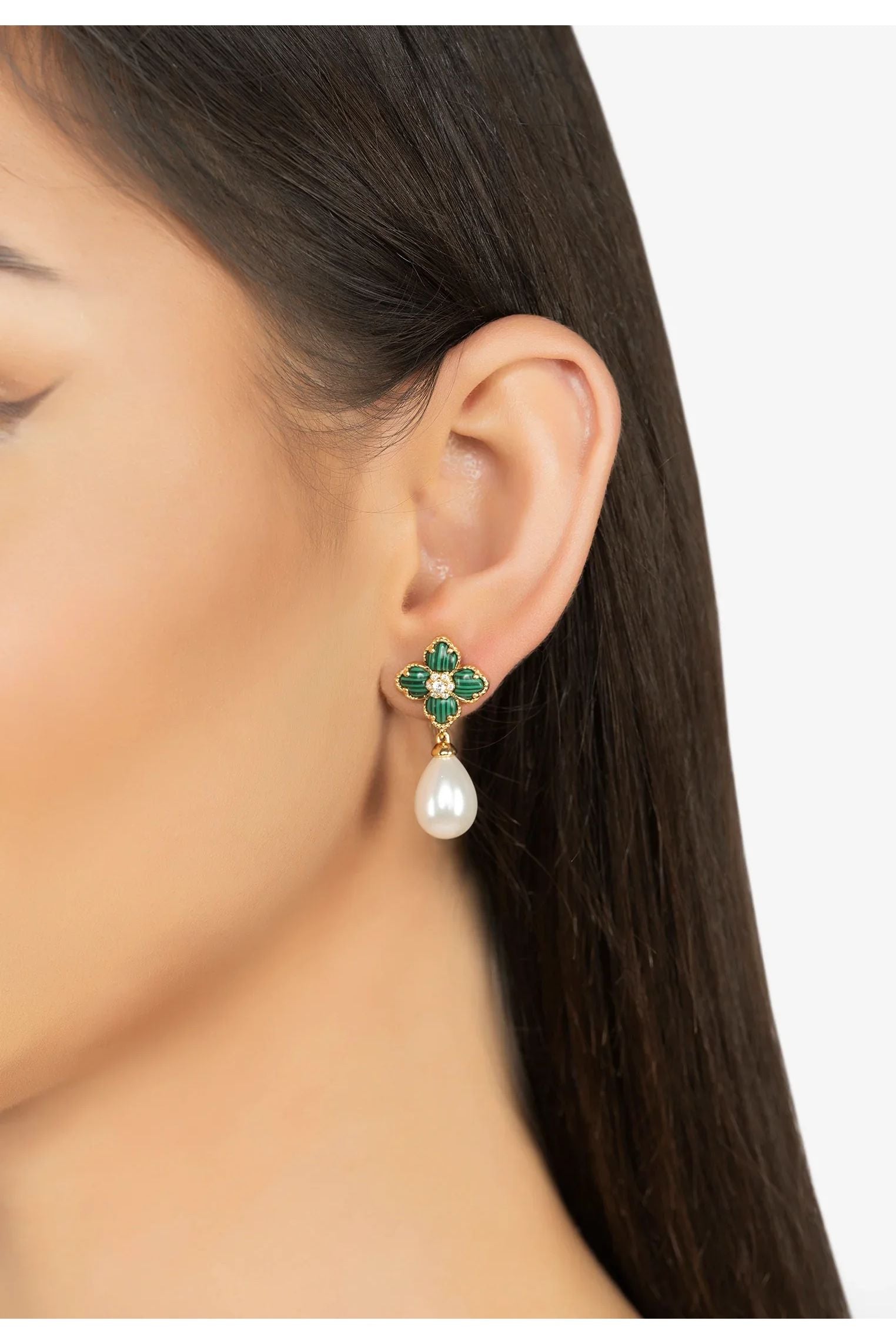 The earring worn by a model.