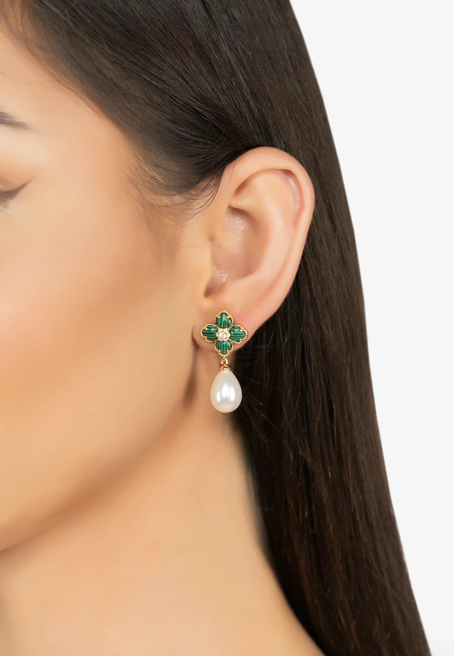 The earring worn by a model.