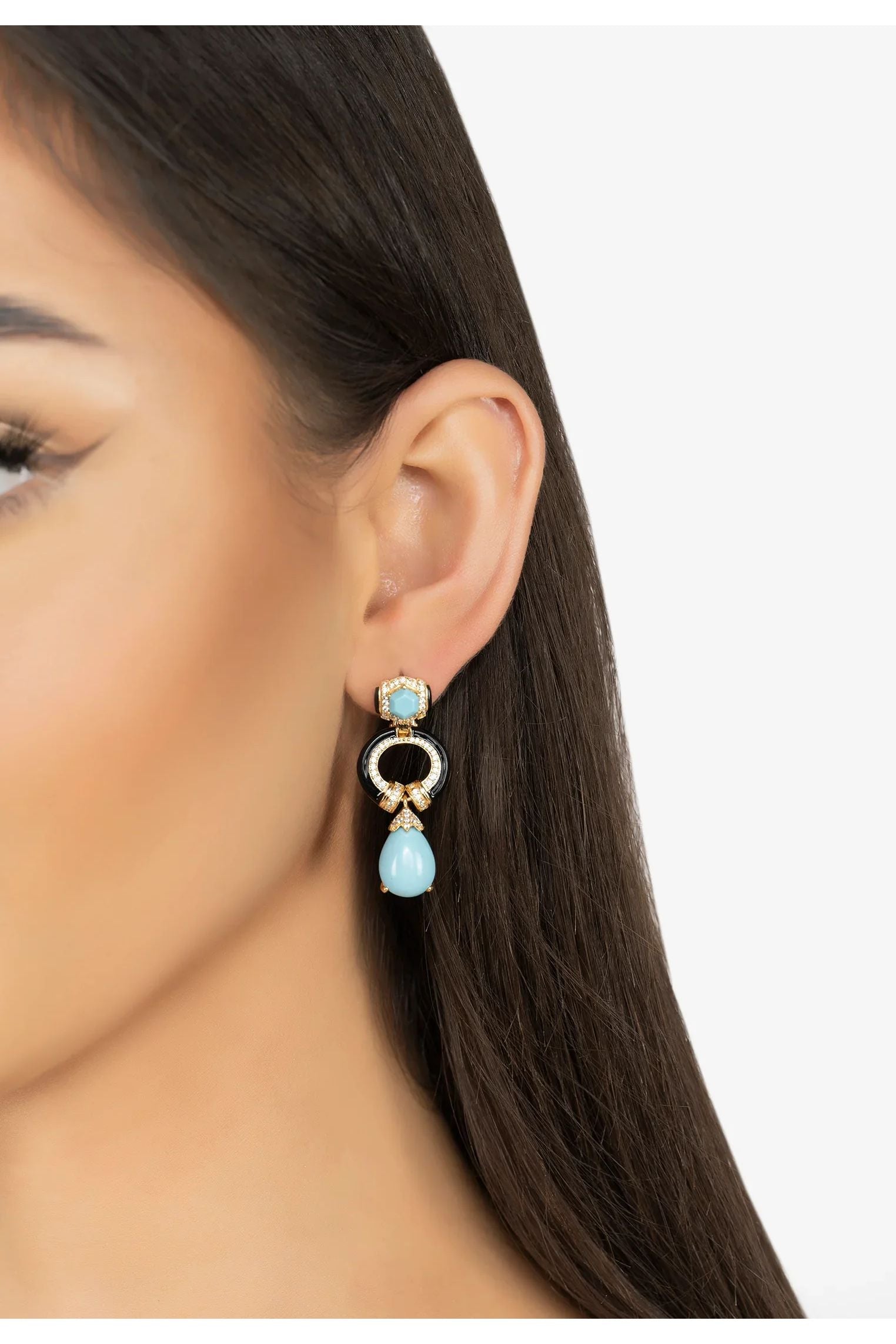 The earring worn by a model.