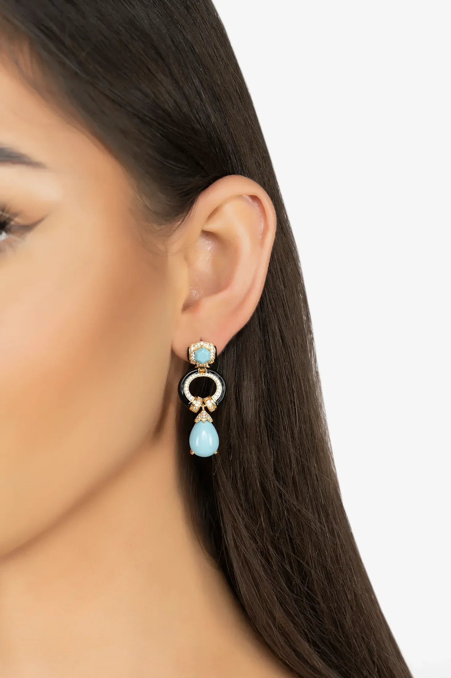 The earring worn by a model.