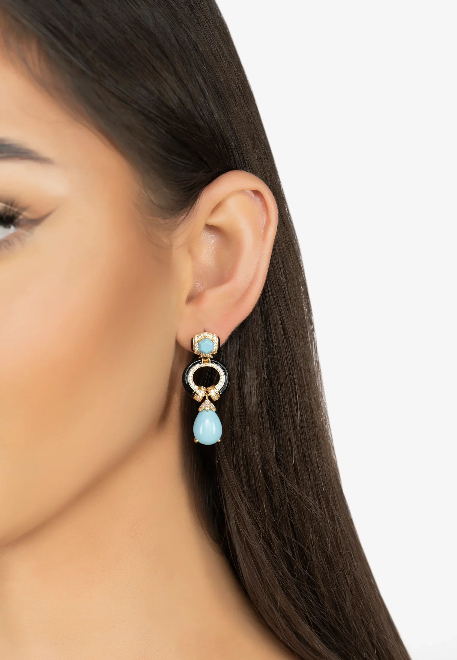 The earring worn by a model.