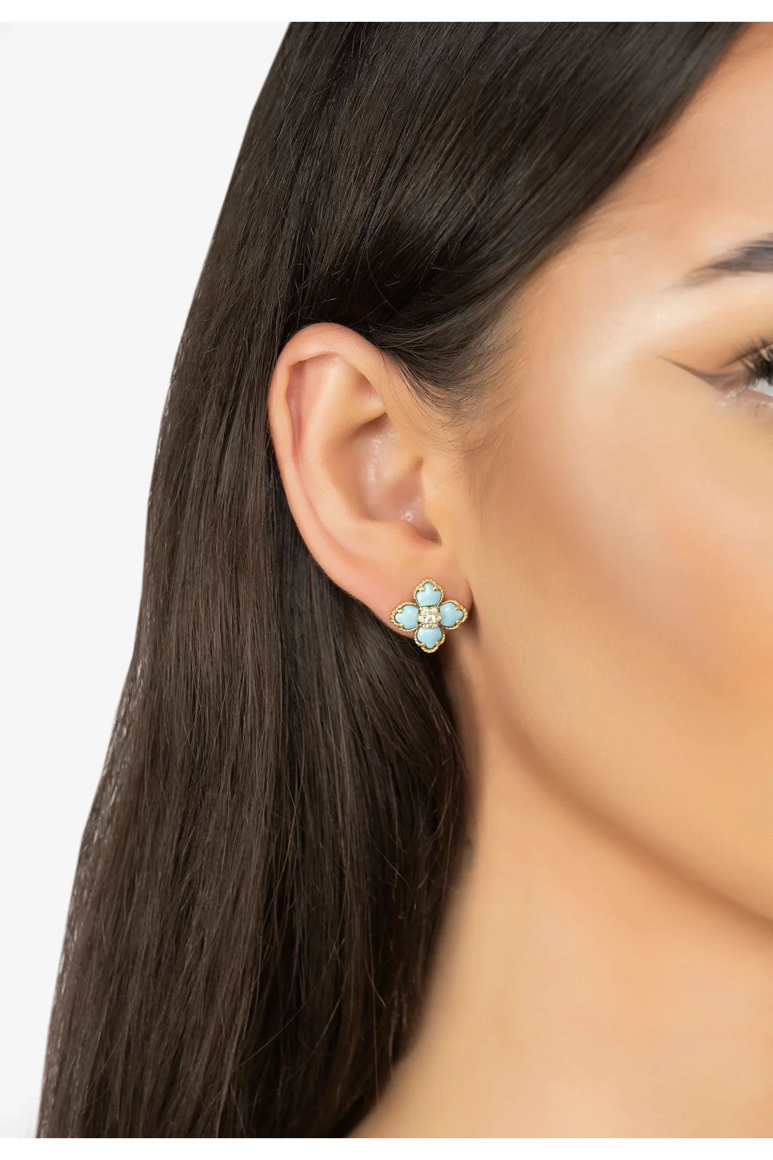 The earring worn by a model.