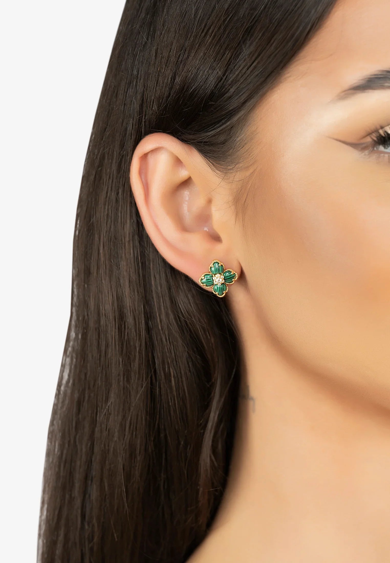The earring worn by a model.