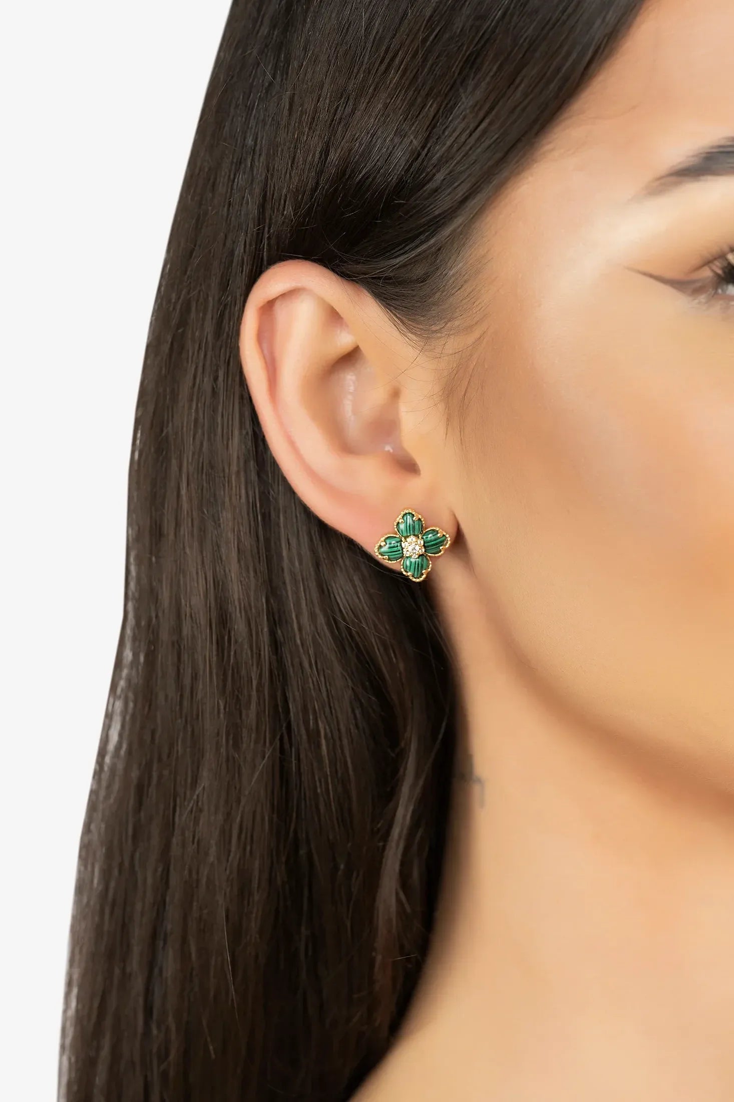 The earring worn by a model.